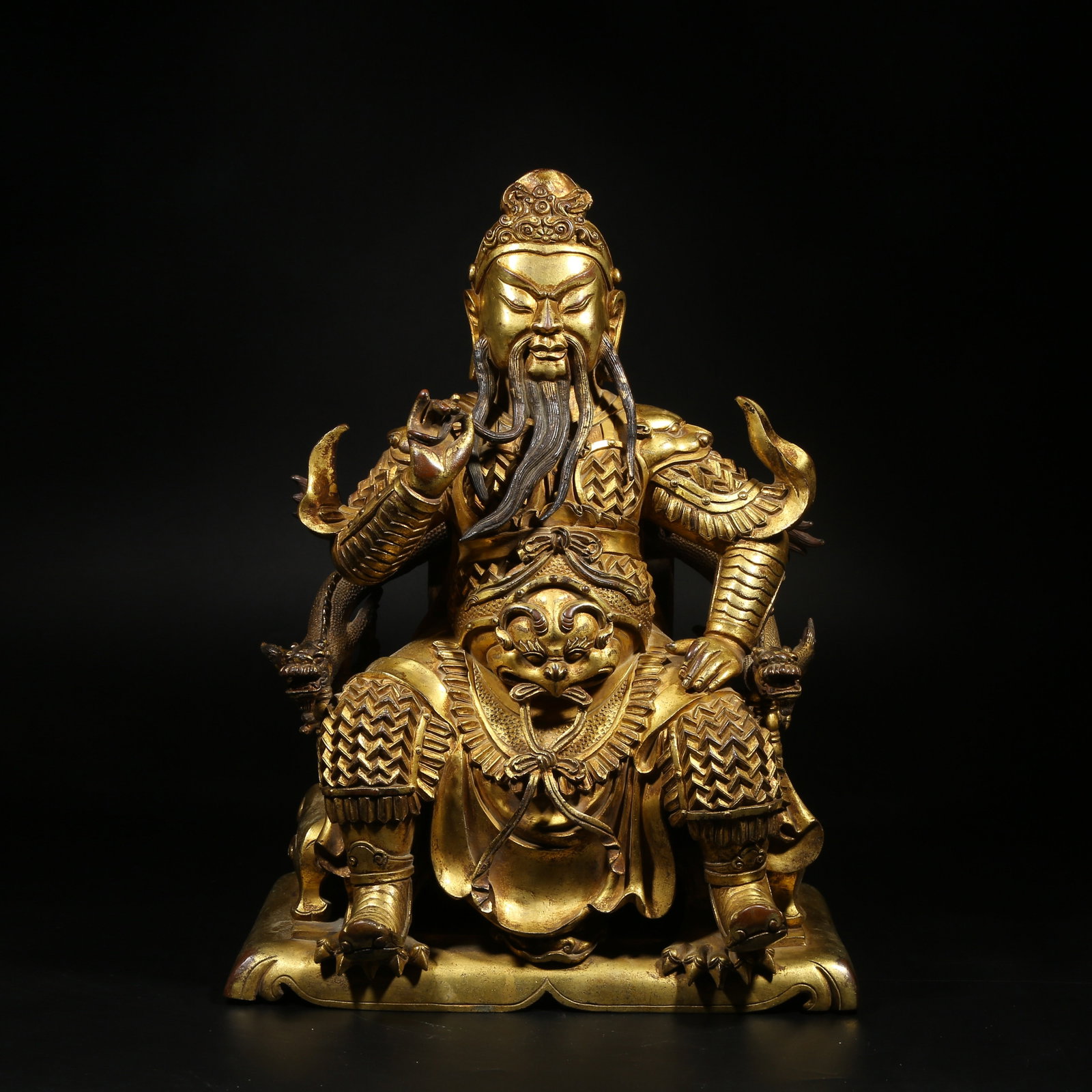 A GILT-BRONZE STATUE OF GUAN YU (1 of 8)