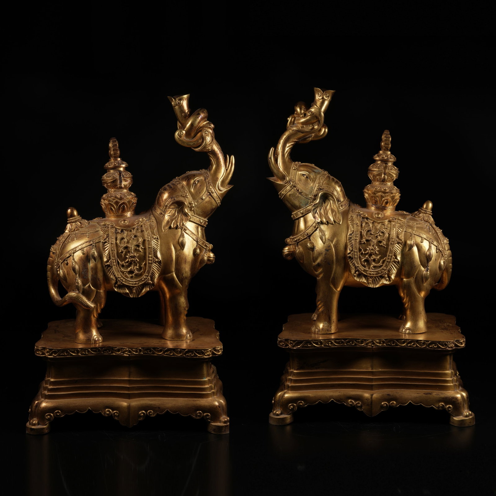 A GILT-BRONZE "PEACEFUL ELEPHANTS" ORNAMENT SET (1 of 12)