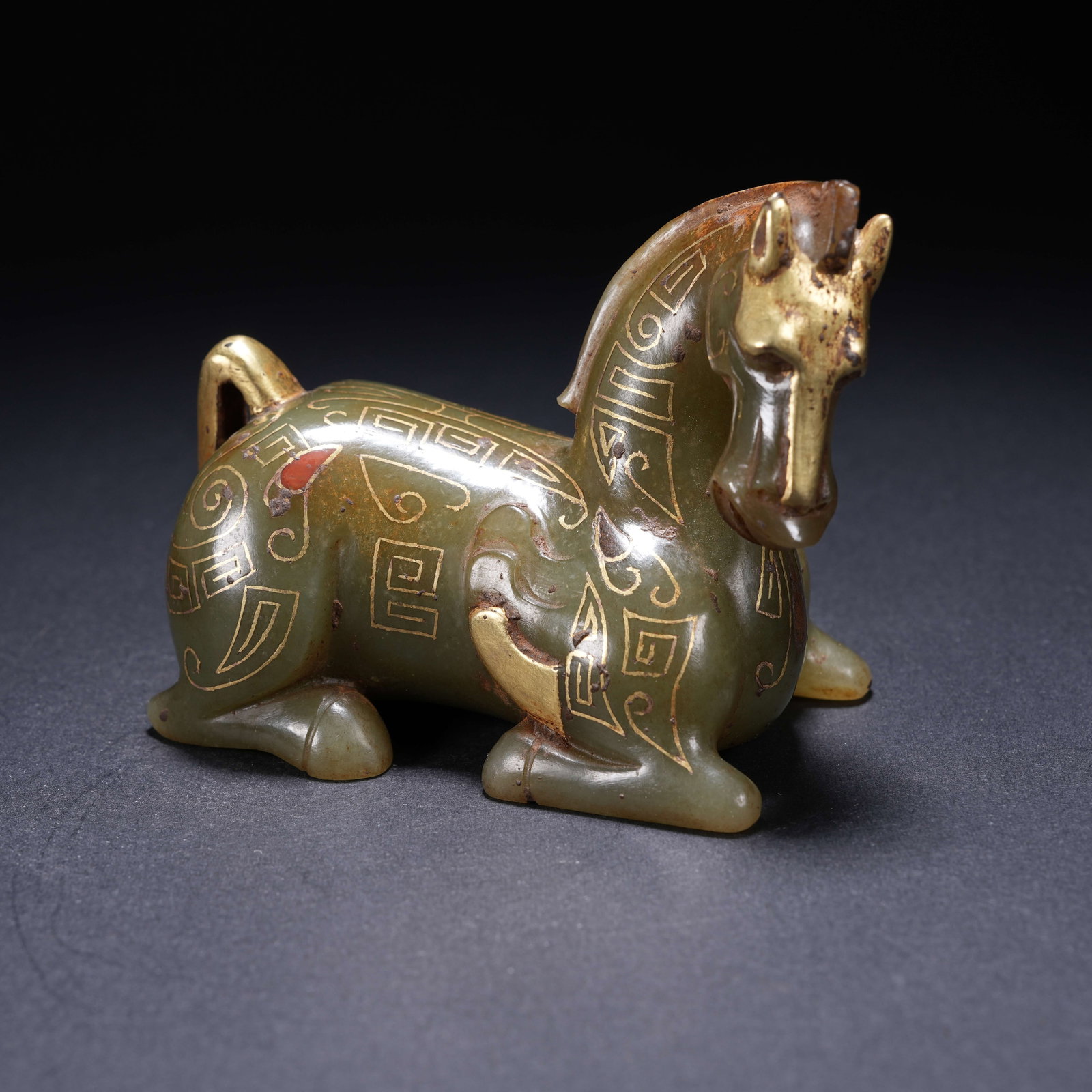 A ARCHAIC JADE RECUMBENT HORSE INLAID WITH GOLD AND GEMS (1 of 8)