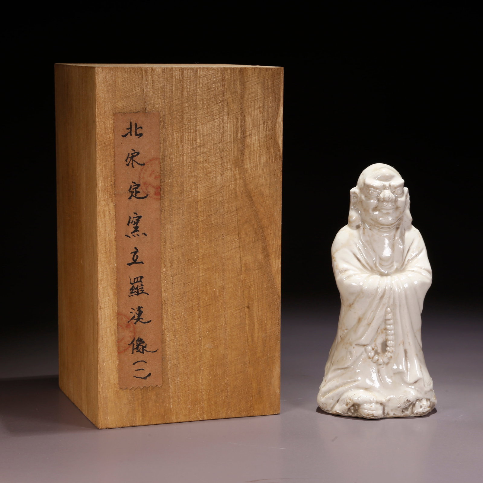 A DING WARE ARHAT FIGURE (1 of 9)