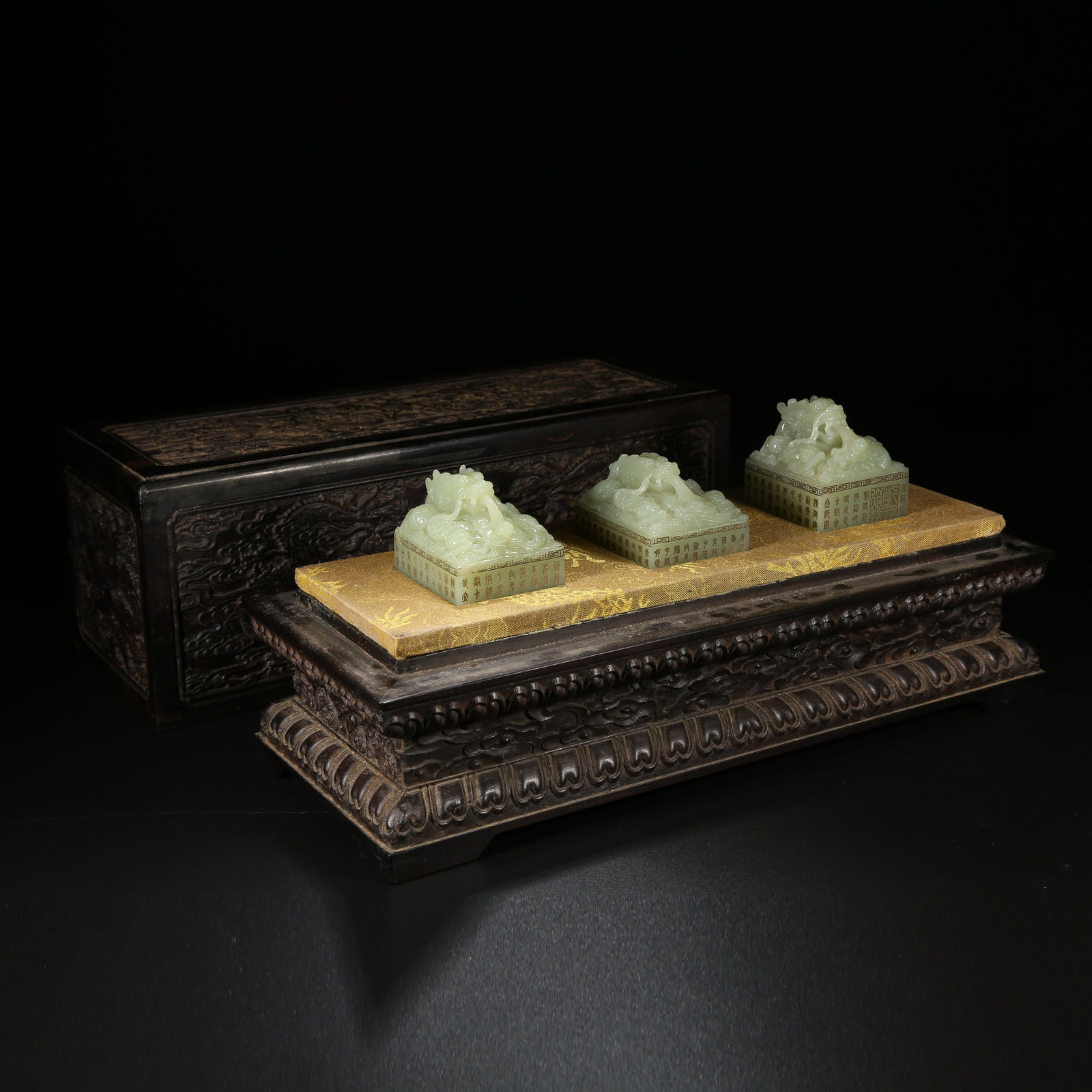 A GROUP OF HETIAN JADE SEALS WITH DRAGON KNOBS (1 of 10)