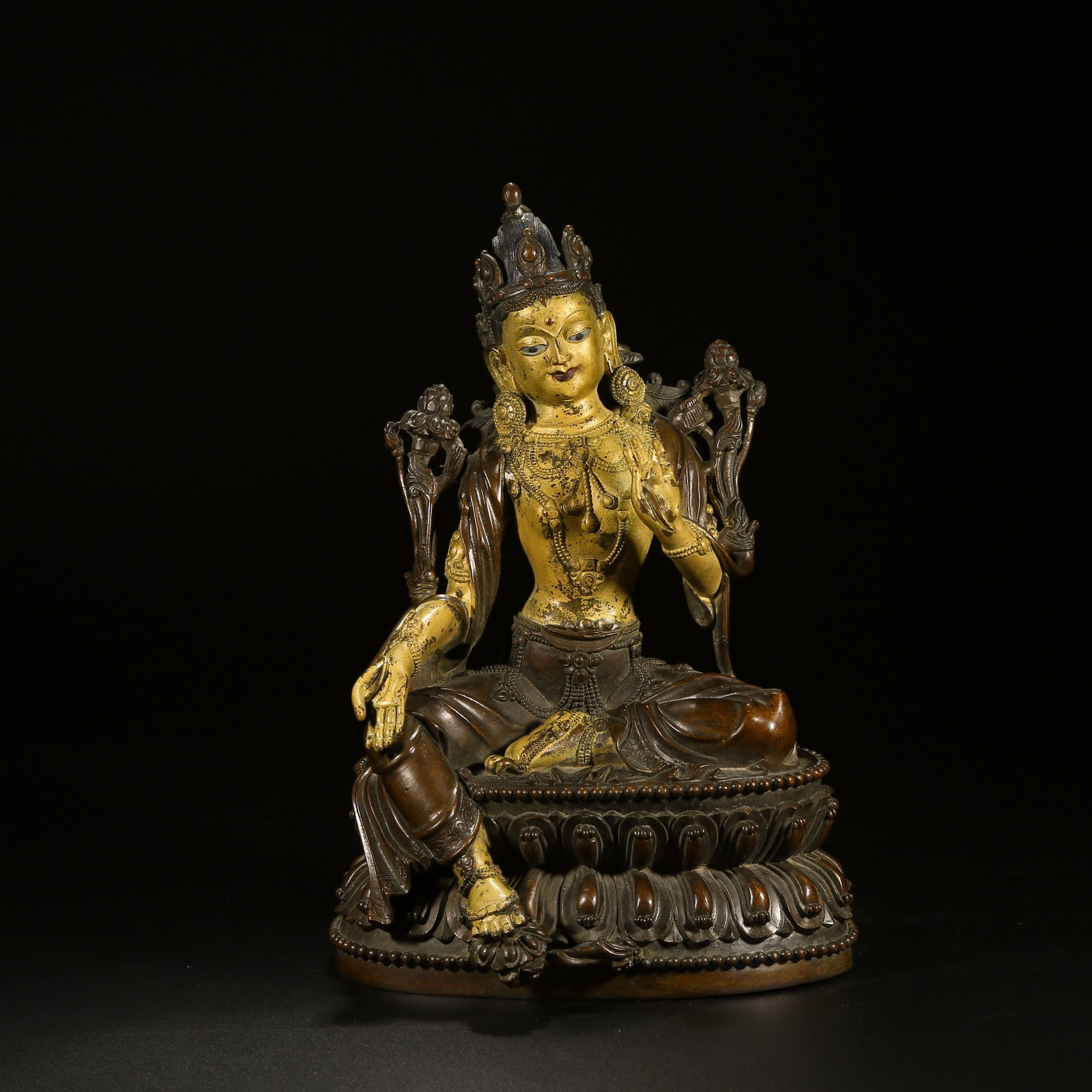 A BRONZE GREEN TARA STATUE WITH PARTIAL GILT DECORATION (1 of 8)