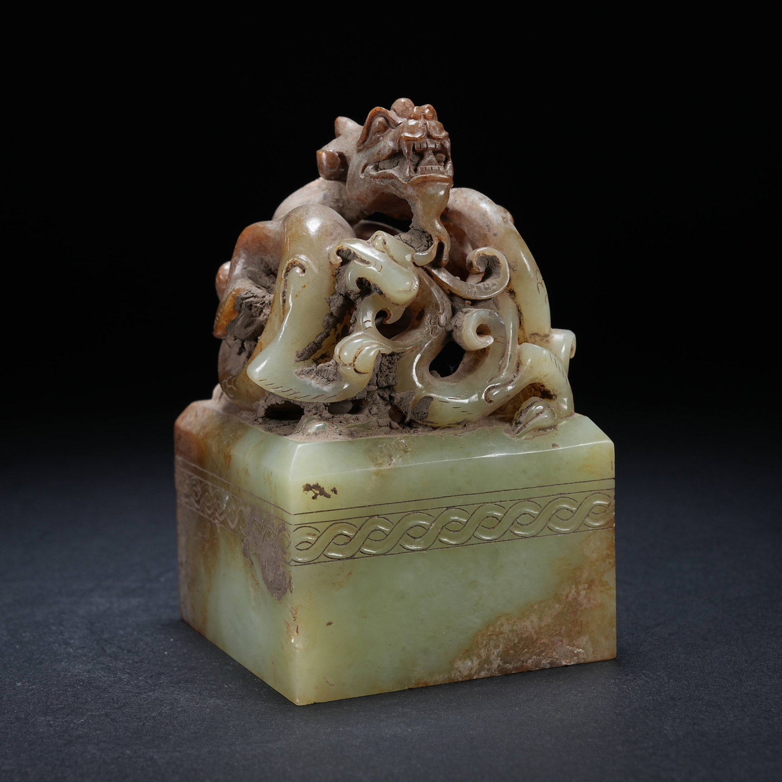 A ARCHAIC JADE SEAL WITH DRAGON AND PHOENIX KNOB: Archaic Jade Seal with Dragon and Phoenix knob