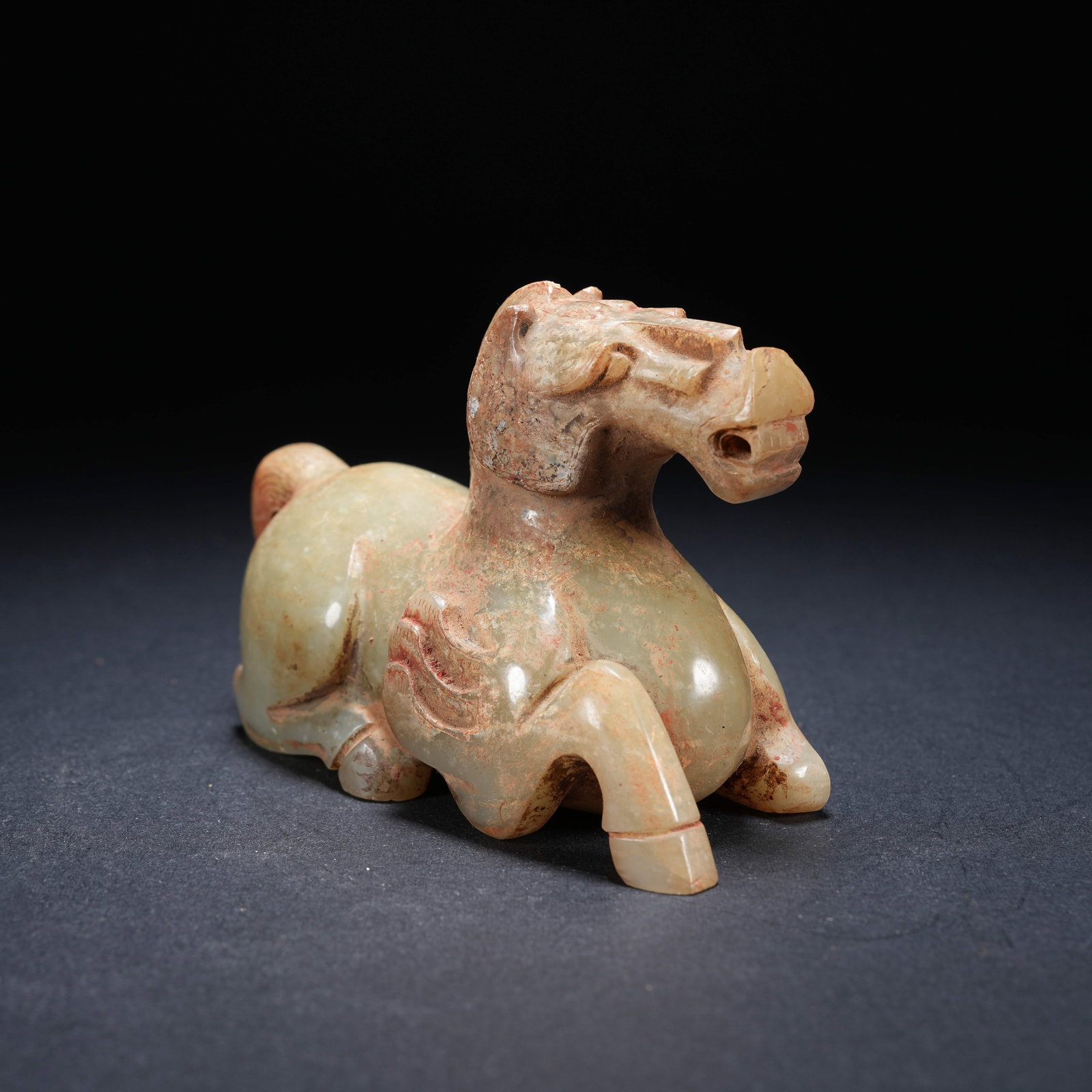 A ARCHAIC JADE RECLINING HORSE ORNAMENT (1 of 8)