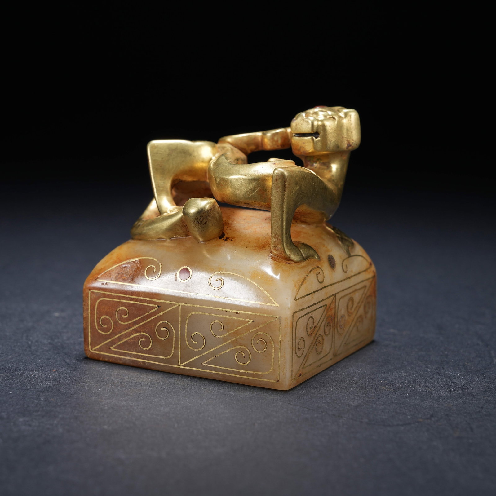 A ARCHAIC JADE SEAL WITH GILDED DRAGON KNOB AND GOLD-SILVER INLAY: Archaic Jade Seal with Gilded Dragon knob and Gold-Silver Inlay