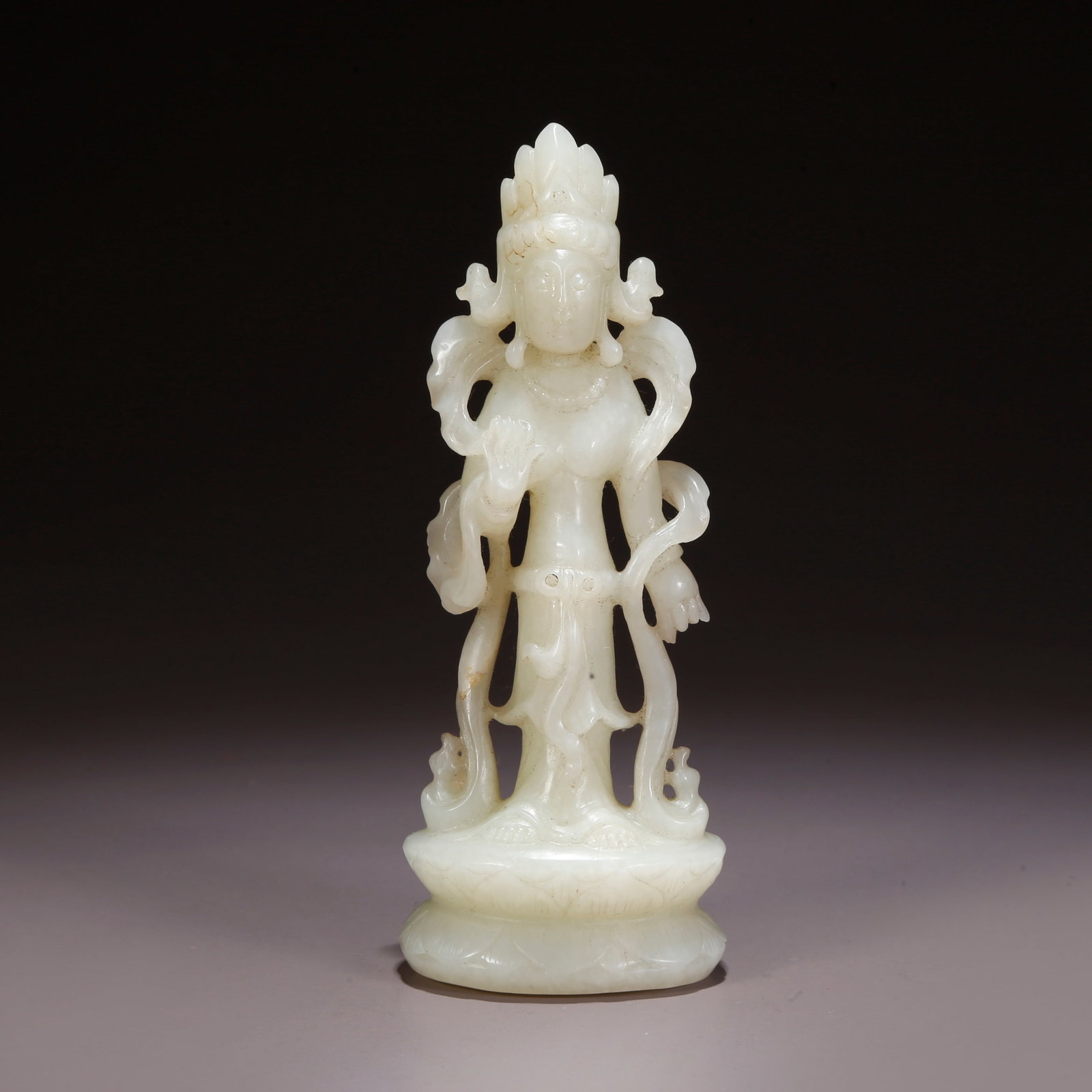 A HETIAN JADE BUDDHA FIGURINE (1 of 9)