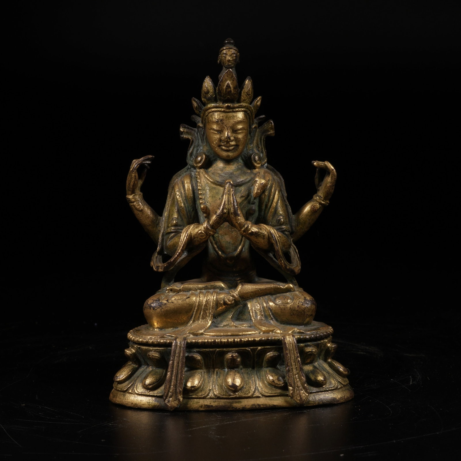 A GILT-BRONZE FOUR-ARMED AVALOKITESHVARA STATUE: Gilt-Bronze Four-Armed Avalokiteshvara Statue