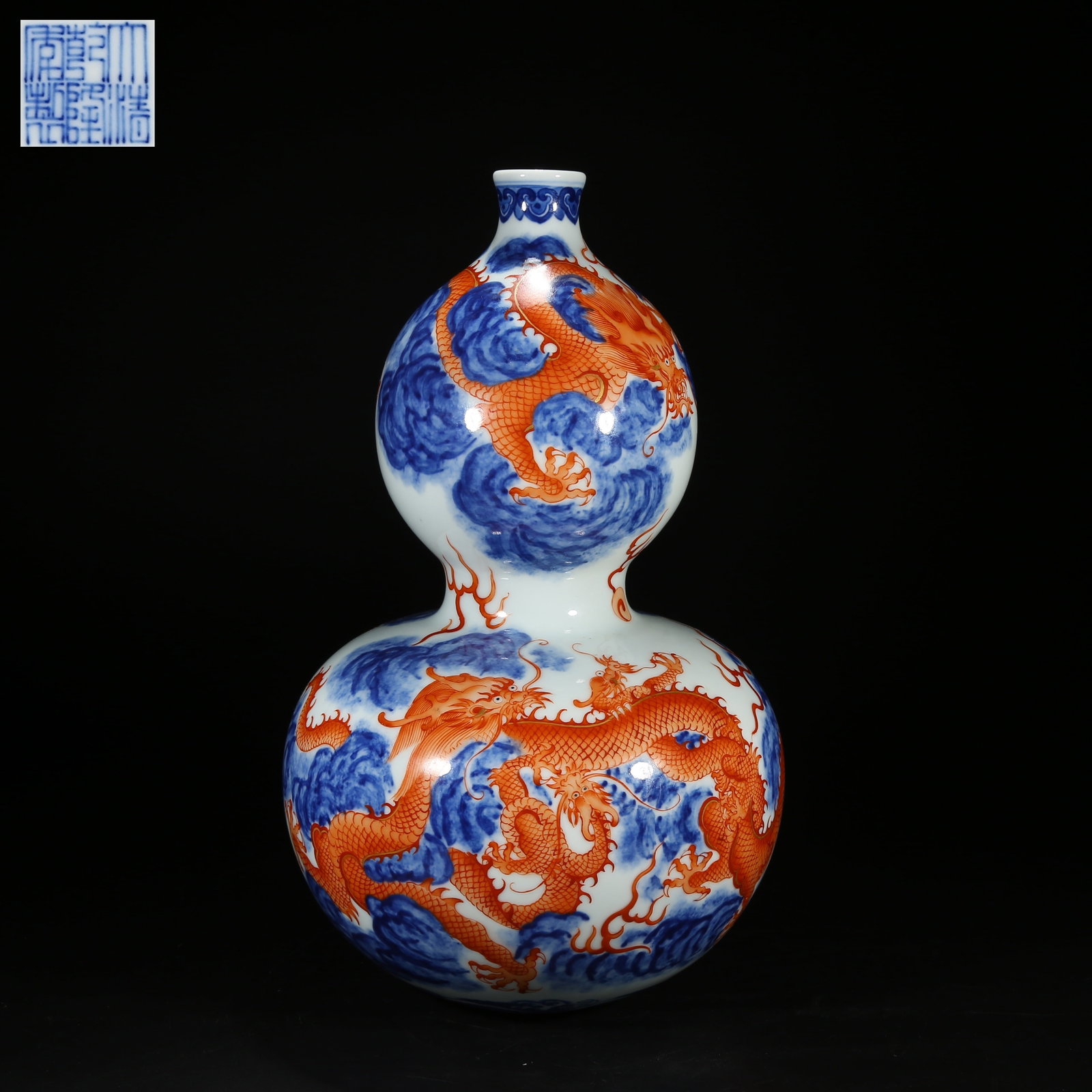 A BLUE AND WHITE WITH UNDERGLAZE RED CLOUD AND DRAGON PATTERN GOURD VASE (1 of 9)