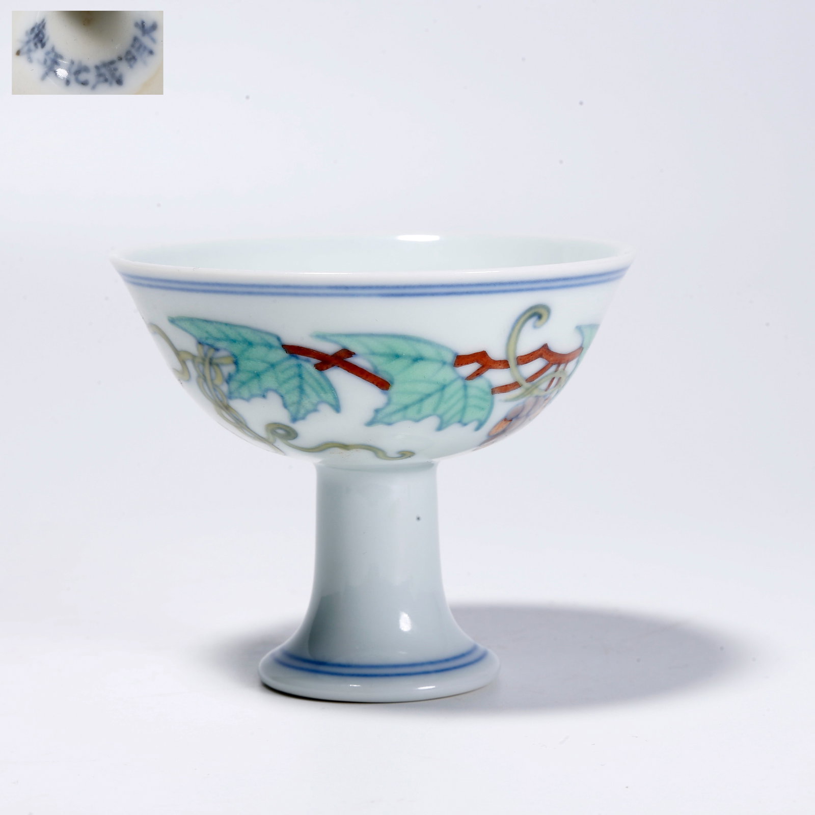 A FAMILLE ROSE STEM CUP WITH GRAPE PATTERN: Famille Rose Stem Cup with Grape Pattern