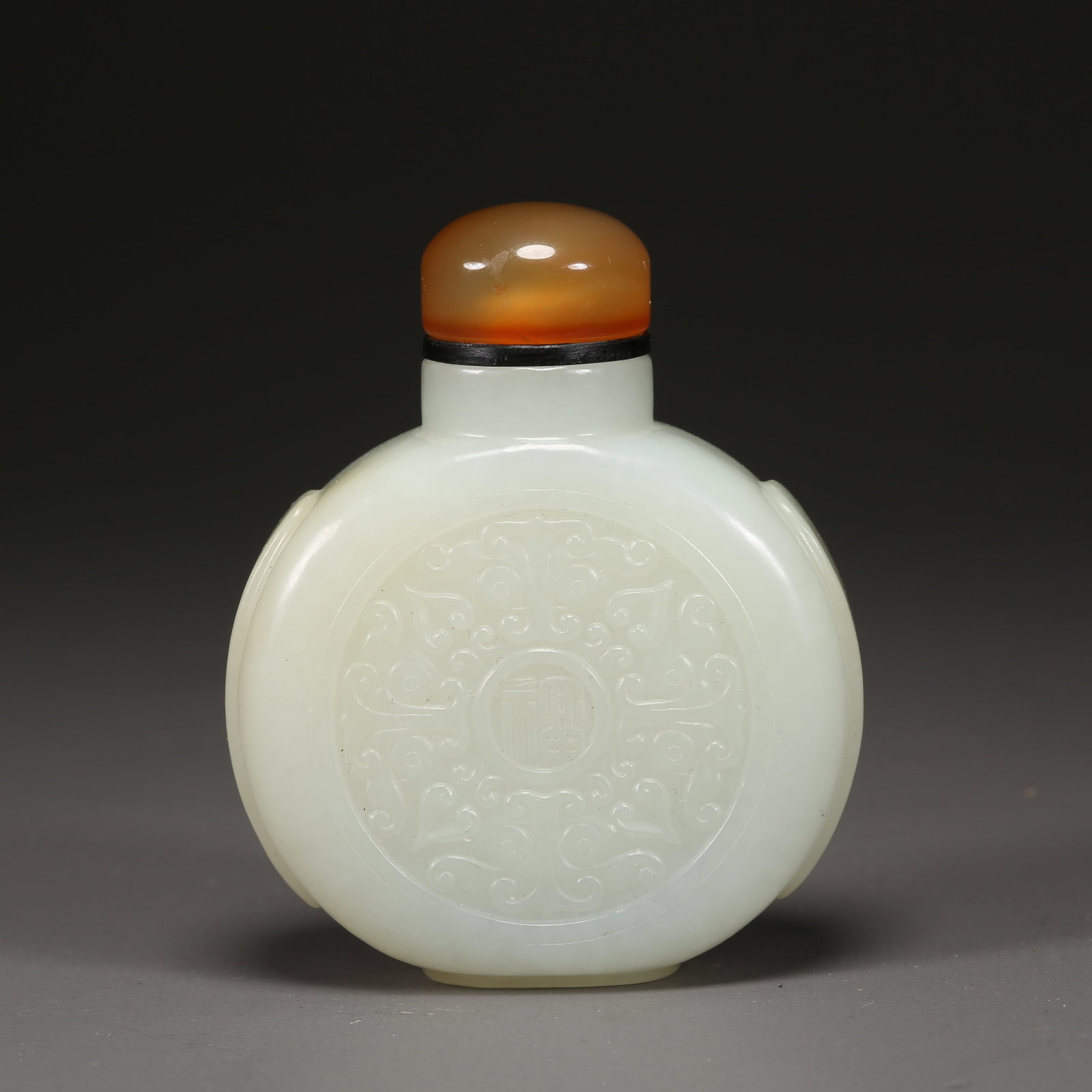 A HETIAN WHITE JADE BEAST-FACE PATTERN SNUFF BOTTLE: Hetian White Jade Beast-Face Pattern Snuff Bottle
