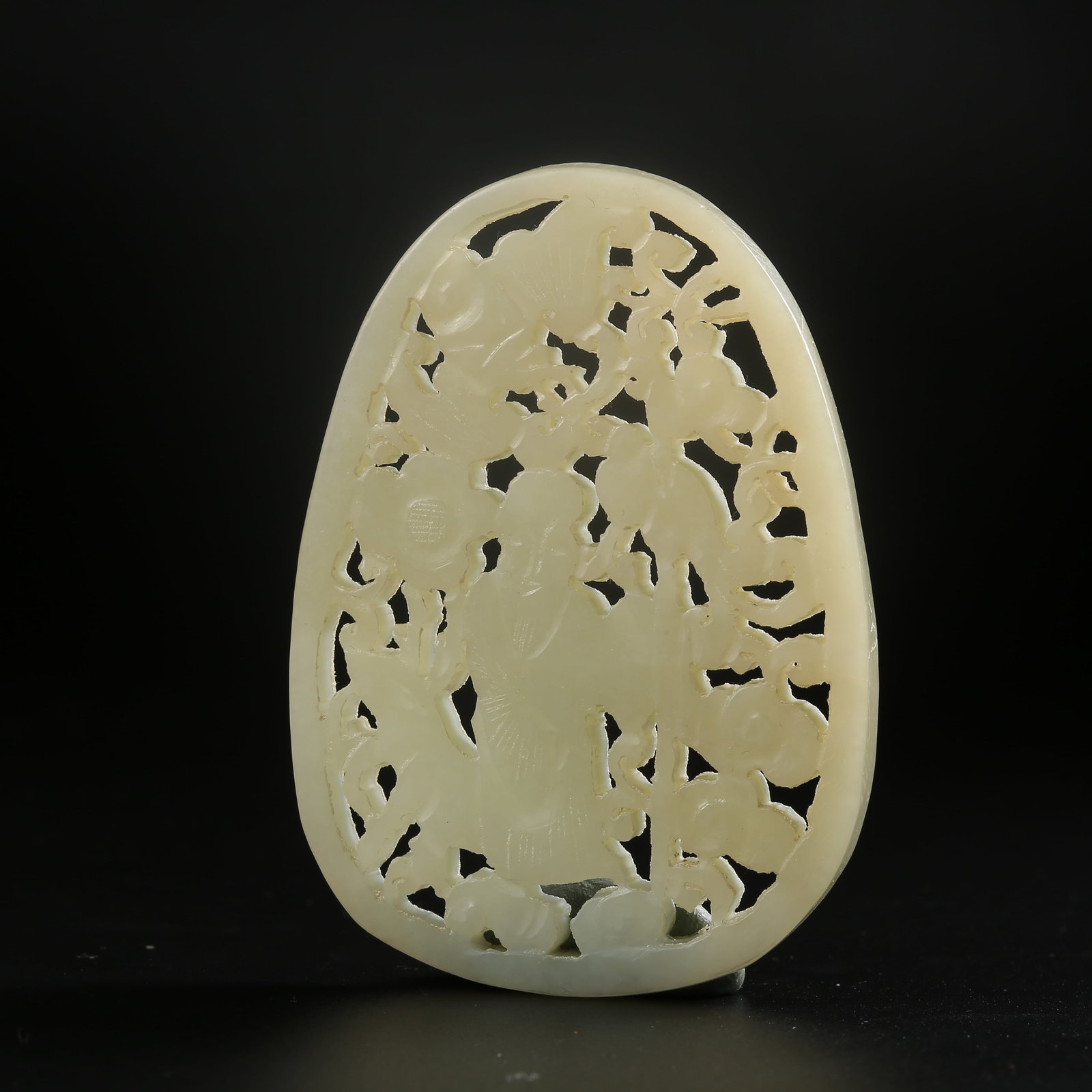 A HETIAN JADE PLAQUE CARVED WITH THE GOD OF LONGEVITY MOTIF: Hetian jade plaque carved with the God of Longevity motif