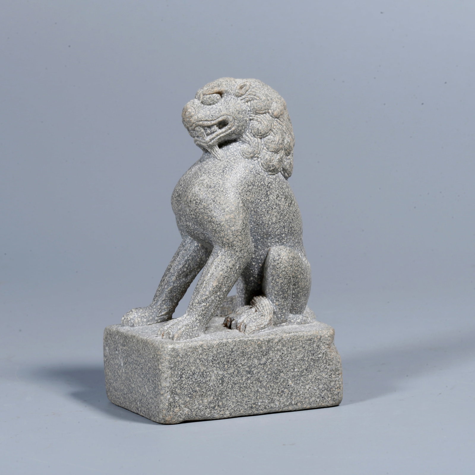A STONE LION-SHAPED ORNAMENT: Stone lion-shaped ornament