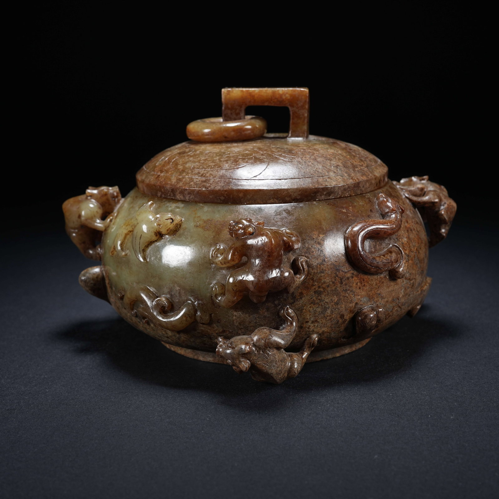 A ARCHAIC JADE CENSER WITH COVER, BEAR MOTIF IN RELIEF AND MOVABLE RINGS: Archaic jade censer with cover, bear motif in relief and movable rings