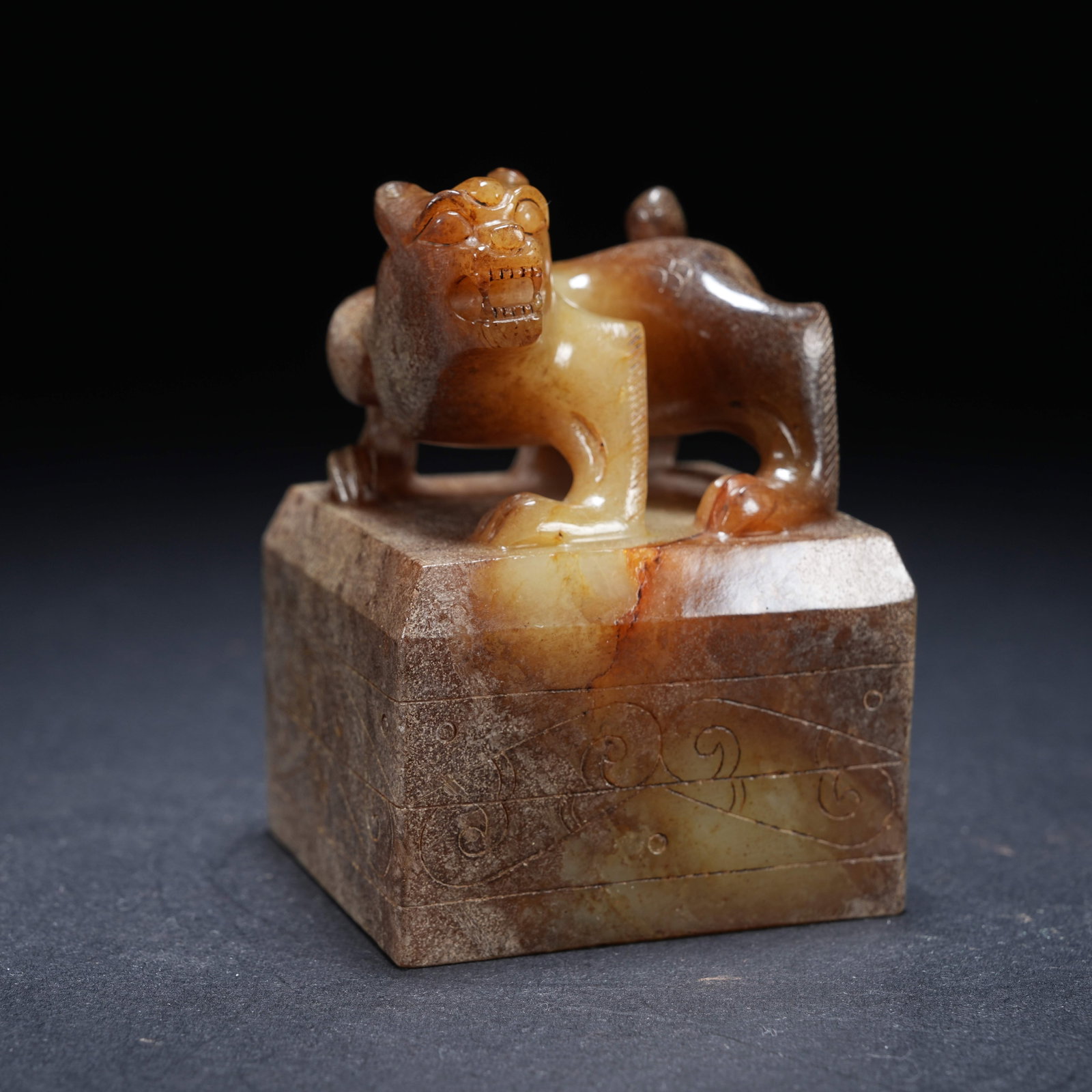 A ARCHAIC JADE SEAL WITH BEAST KNOB: Archaic jade seal with beast knob