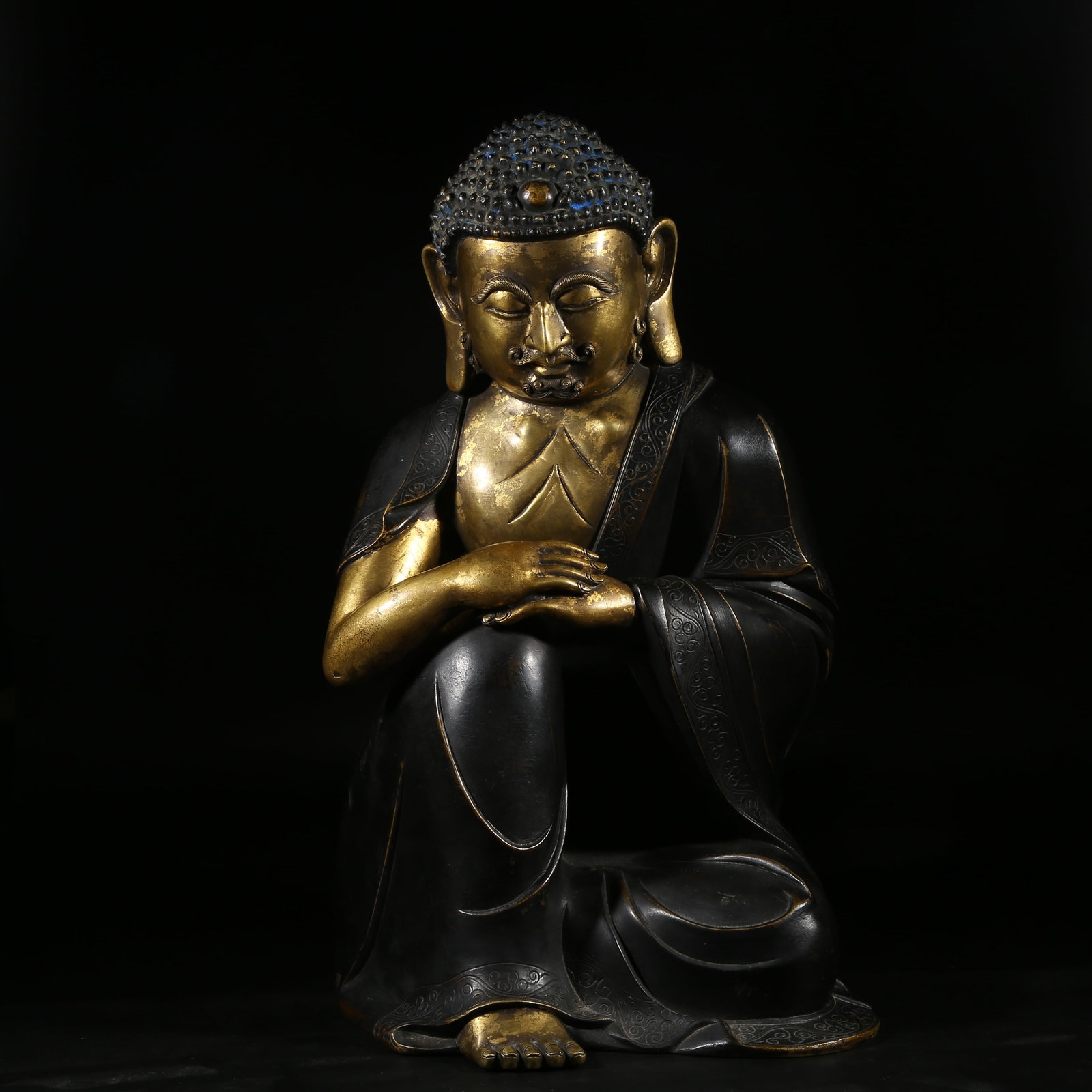 A PARTIALLY GILDED BRONZE STATUE OF SNOW MOUNTAIN DEITY (1 of 8)