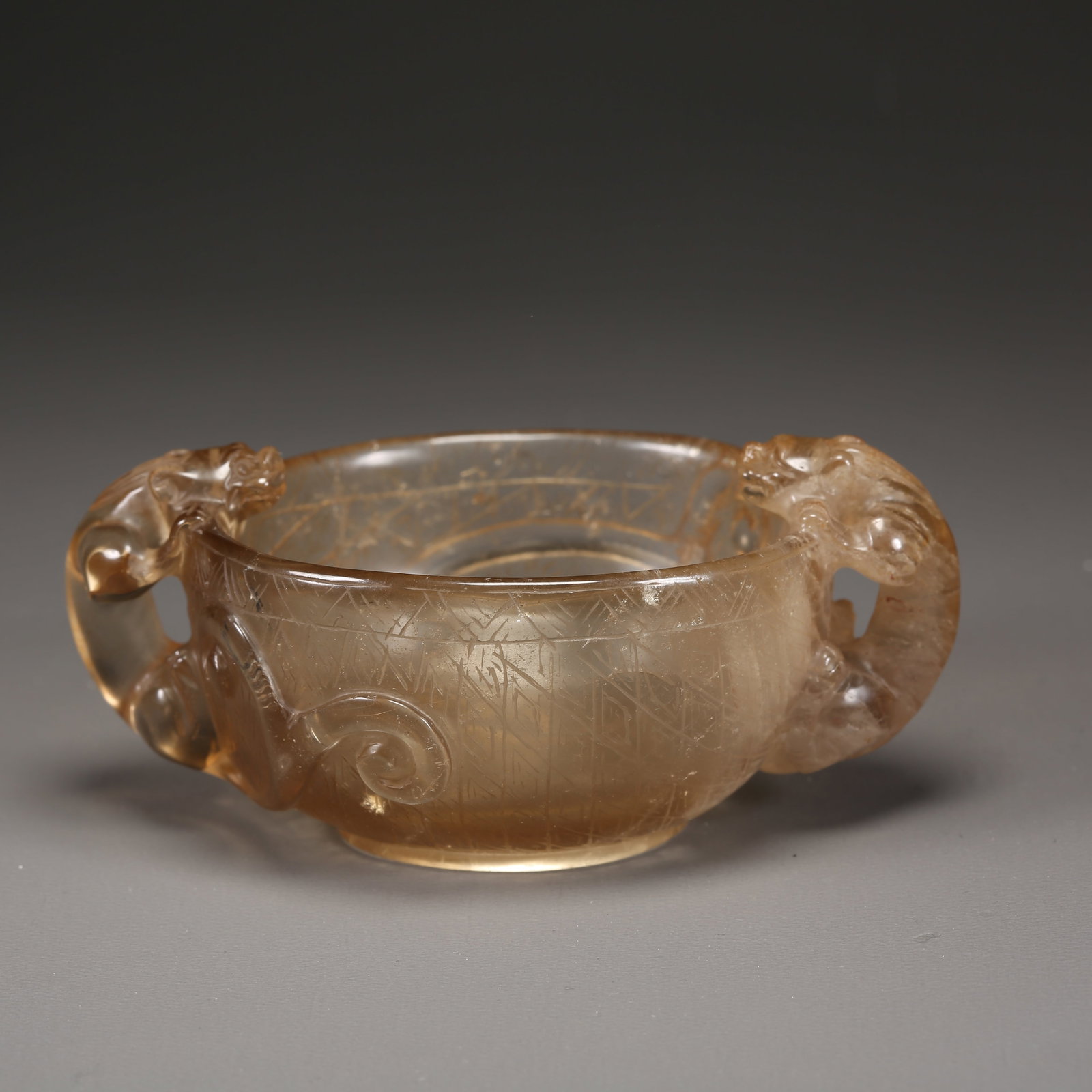 A CRYSTAL CUP WITH DRAGON-FORM HANDLES: Crystal Cup with Dragon-Form Handles
