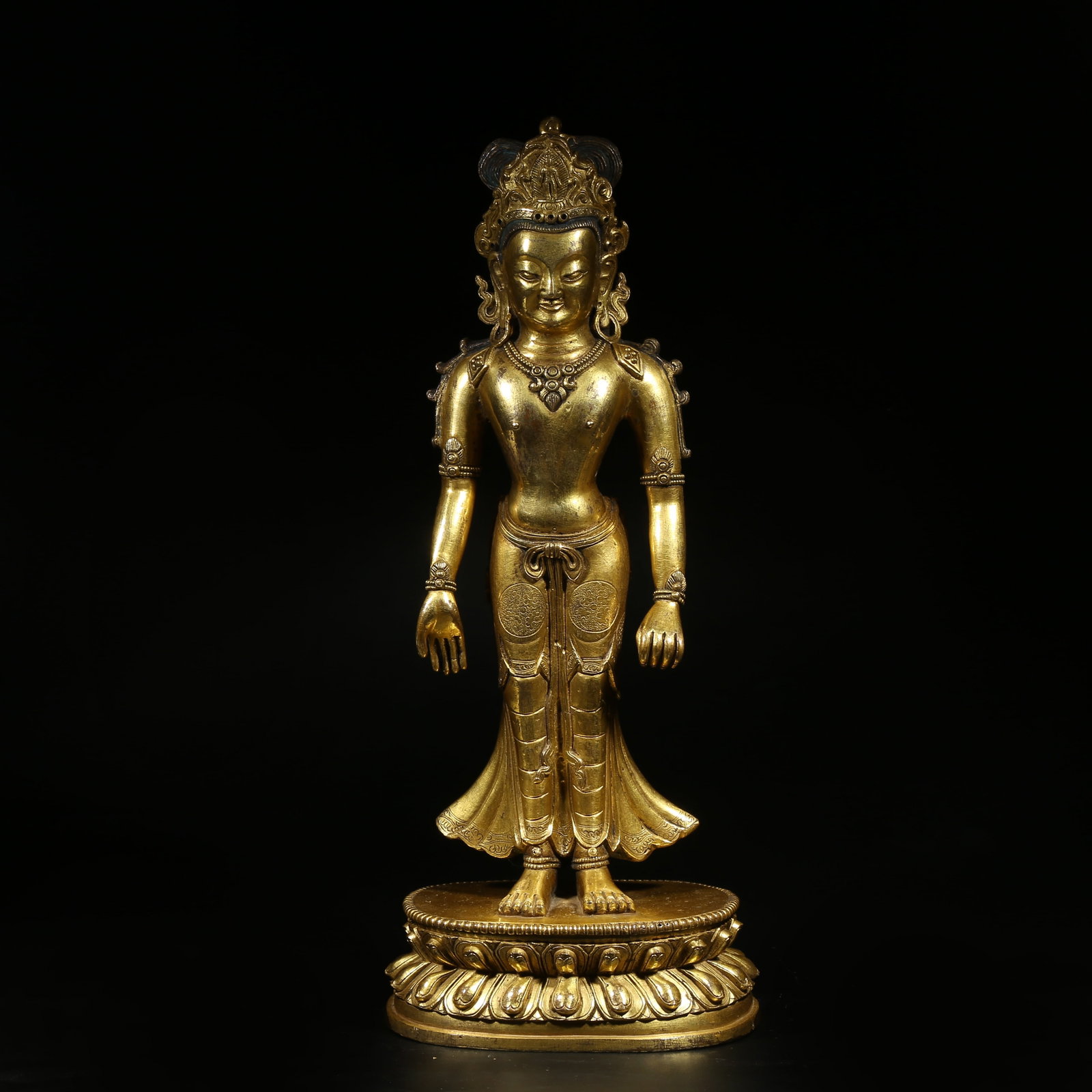 A GILDED BRONZE STANDING STATUE OF AVALOKITESHVARA (1 of 8)