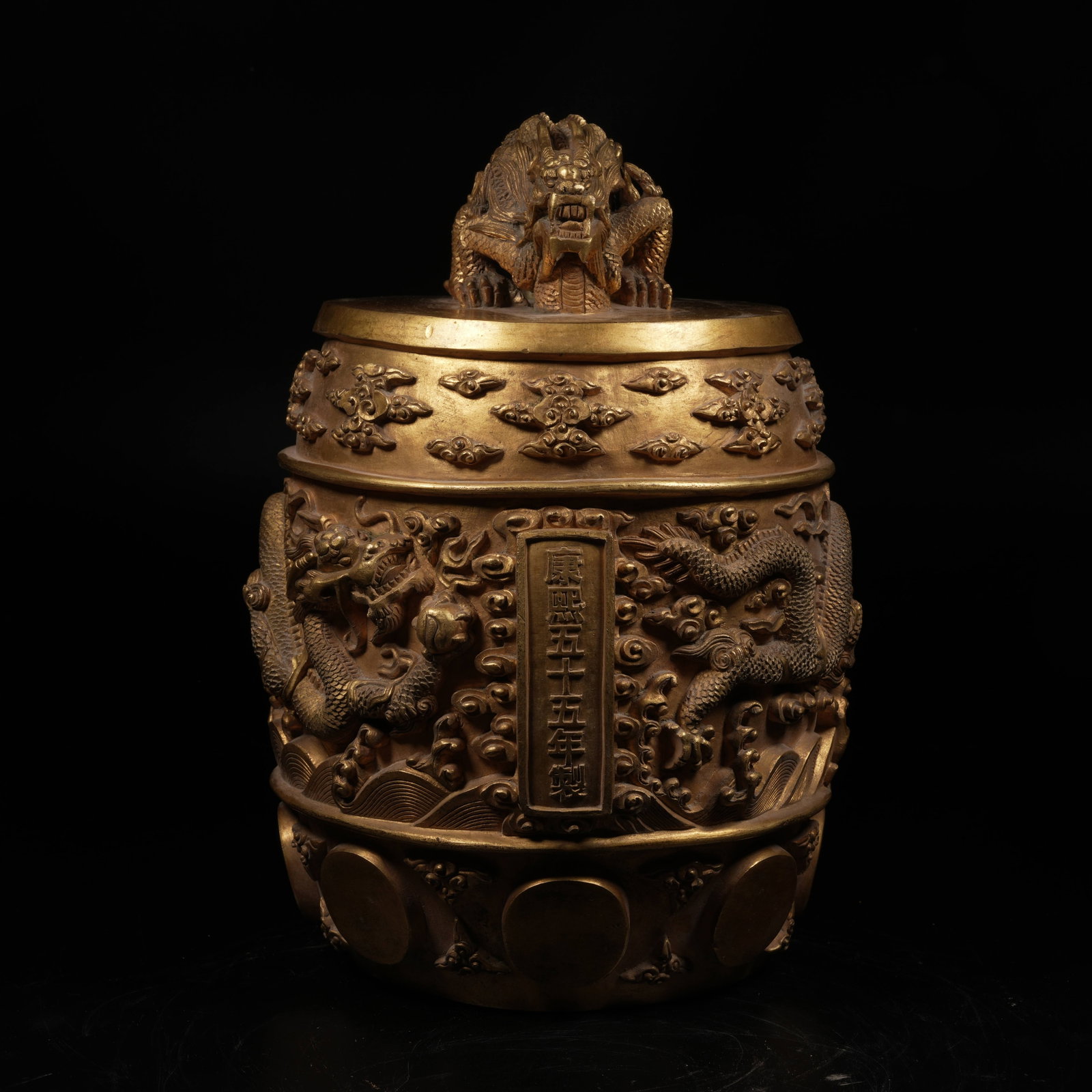 A GILT-BRONZE YONGZHONG BELL WITH INTERTWINED DRAGON KNOB (1 of 9)