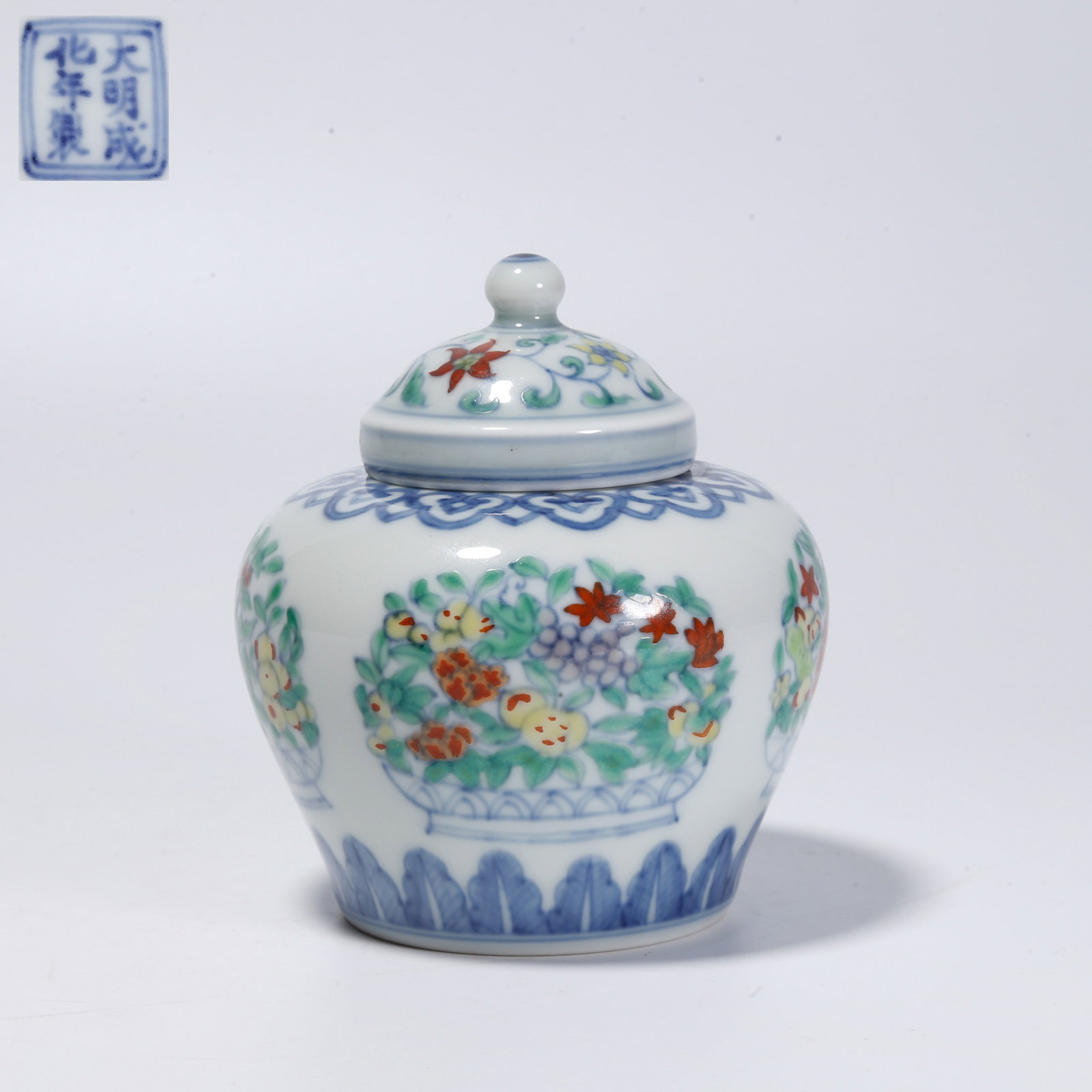 A DOUCAI COVERED JAR WITH FLOWER AND PLANT PATTERN (1 of 9)