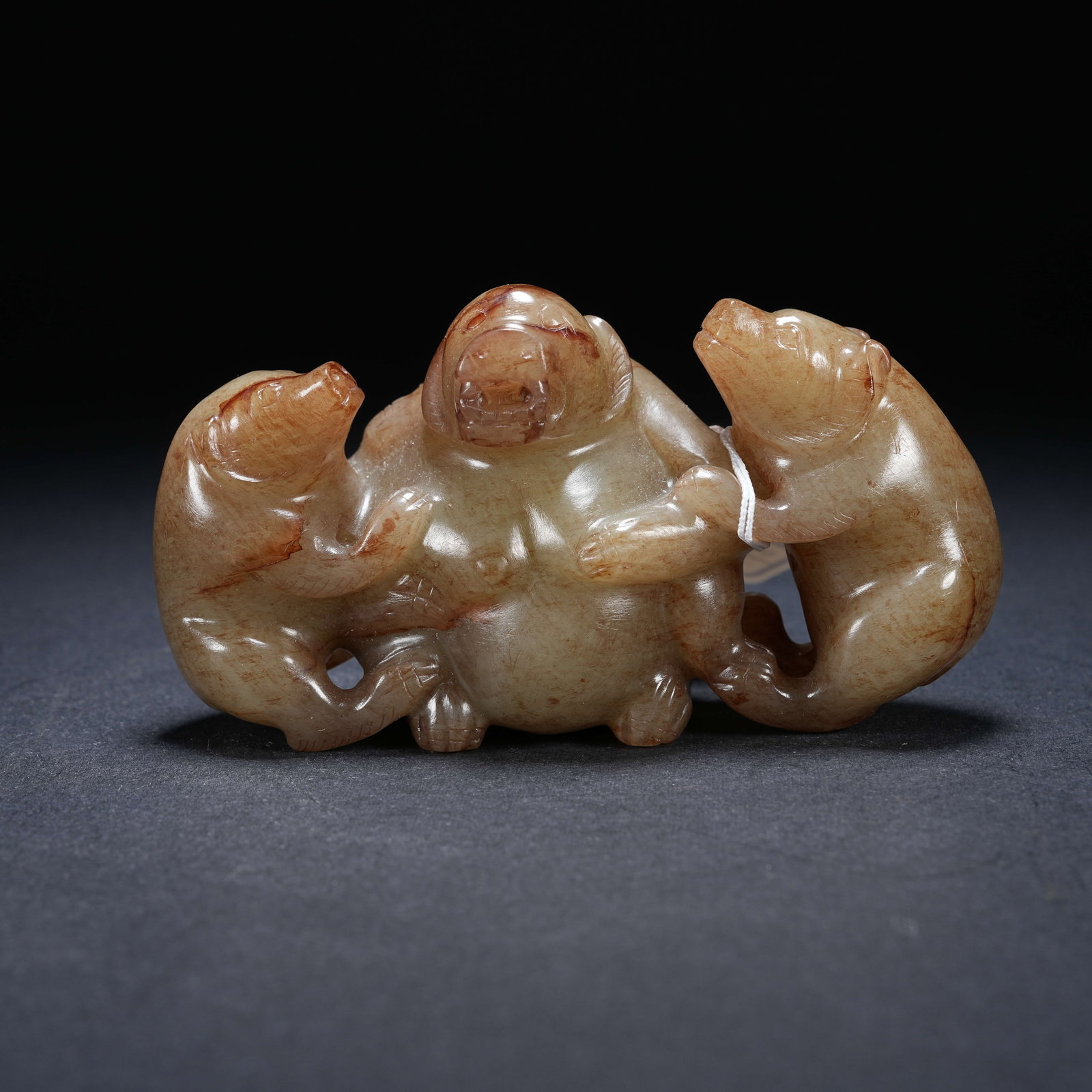 A ARCHAIC JADE ORNAMENT OF THREE BEARS (1 of 8)