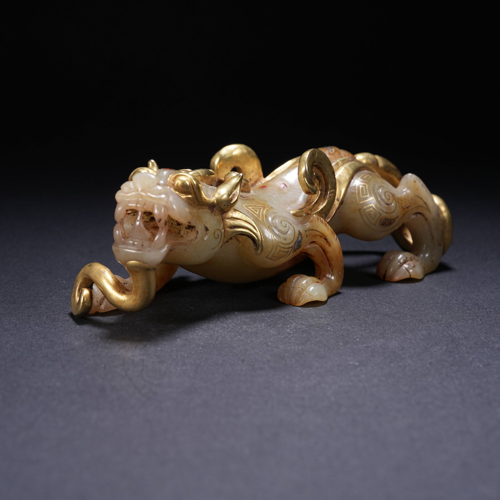A ARCHAIC JADE BELT HOOK WITH DRAGON-HEAD, INLAID WITH GOLD, SILVER, AND GEMS (1 of 8)