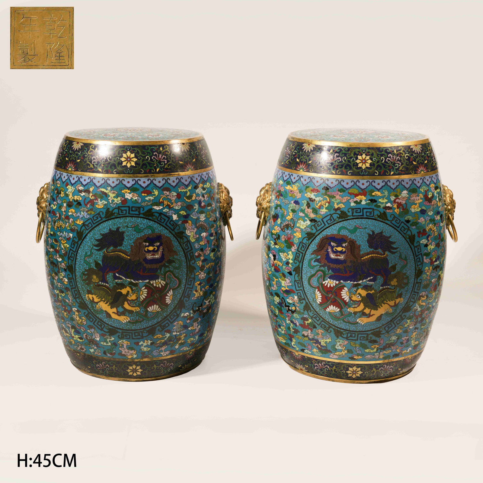 A SET OF CLOISONNE ENAMEL ON BRONZE DRUM STOOLS WITH LION PLAYING WITH A BROCADE BALL MOTIF (1 of 10)