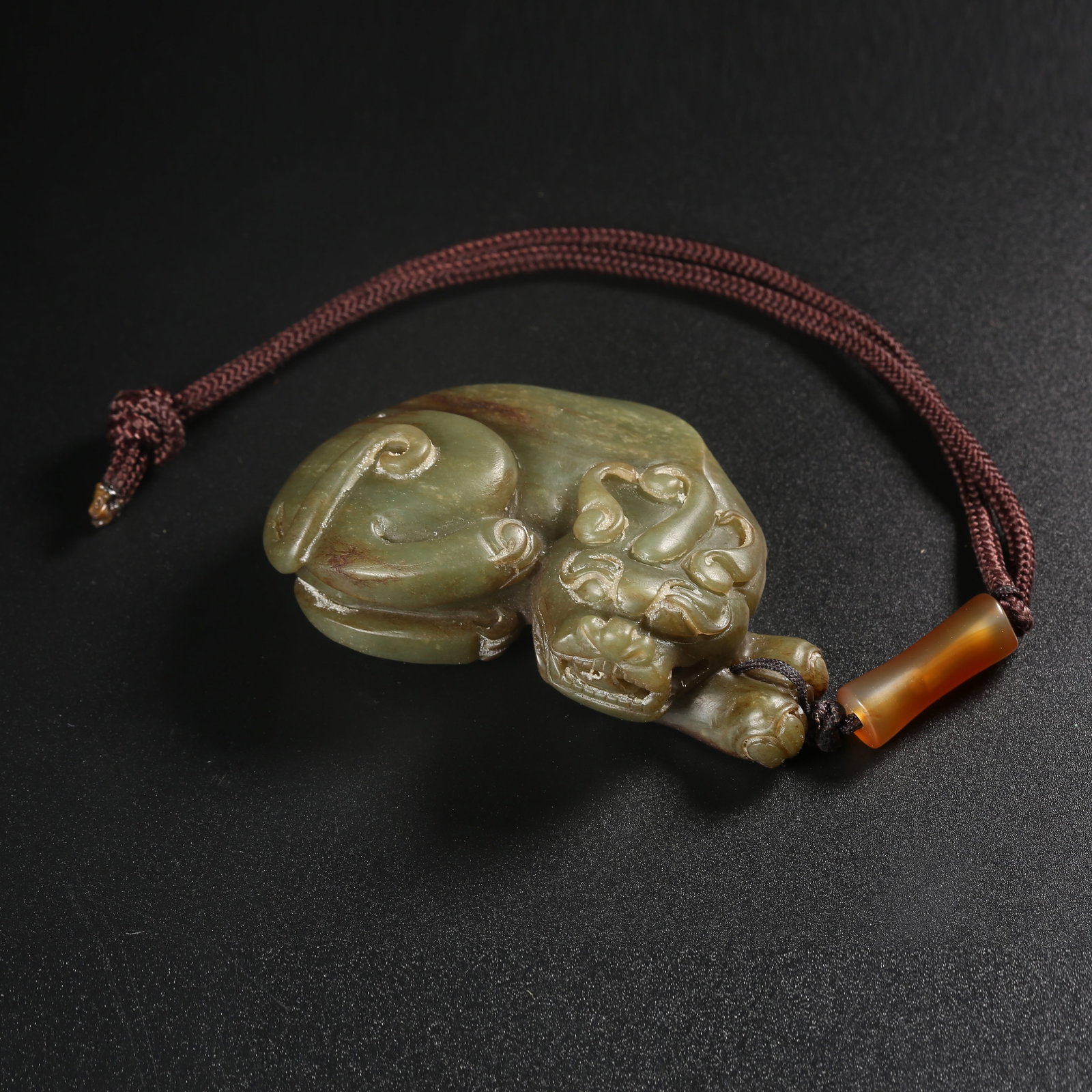 A ARCHAIC JADE BIXIE (MYTHICAL GUARDIAN BEAST) PENDANT: Archaic jade bixie (mythical guardian beast) pendant