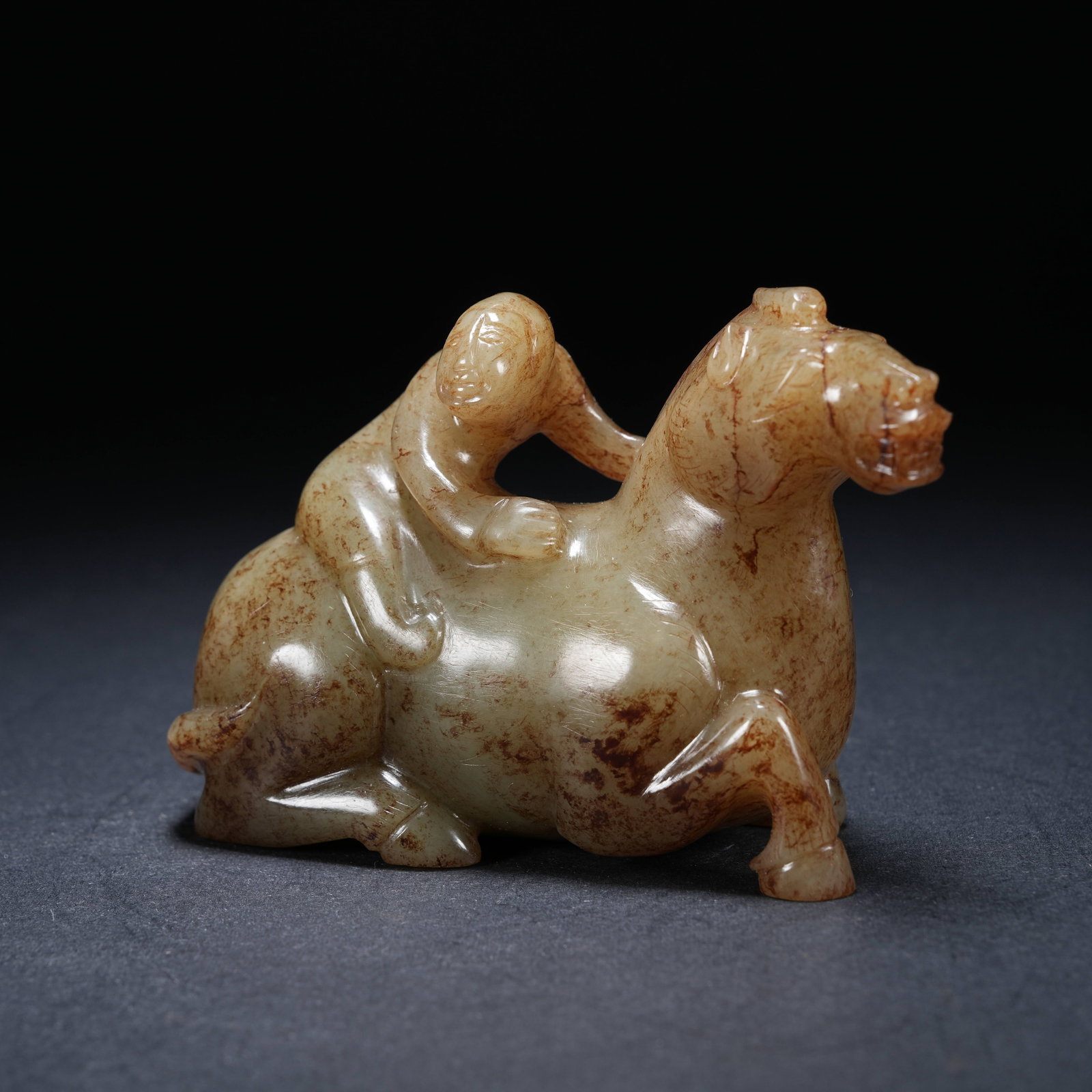 A ARCHAIC JADE ORNAMENT OF FIGURE ON HORSEBACK (1 of 8)