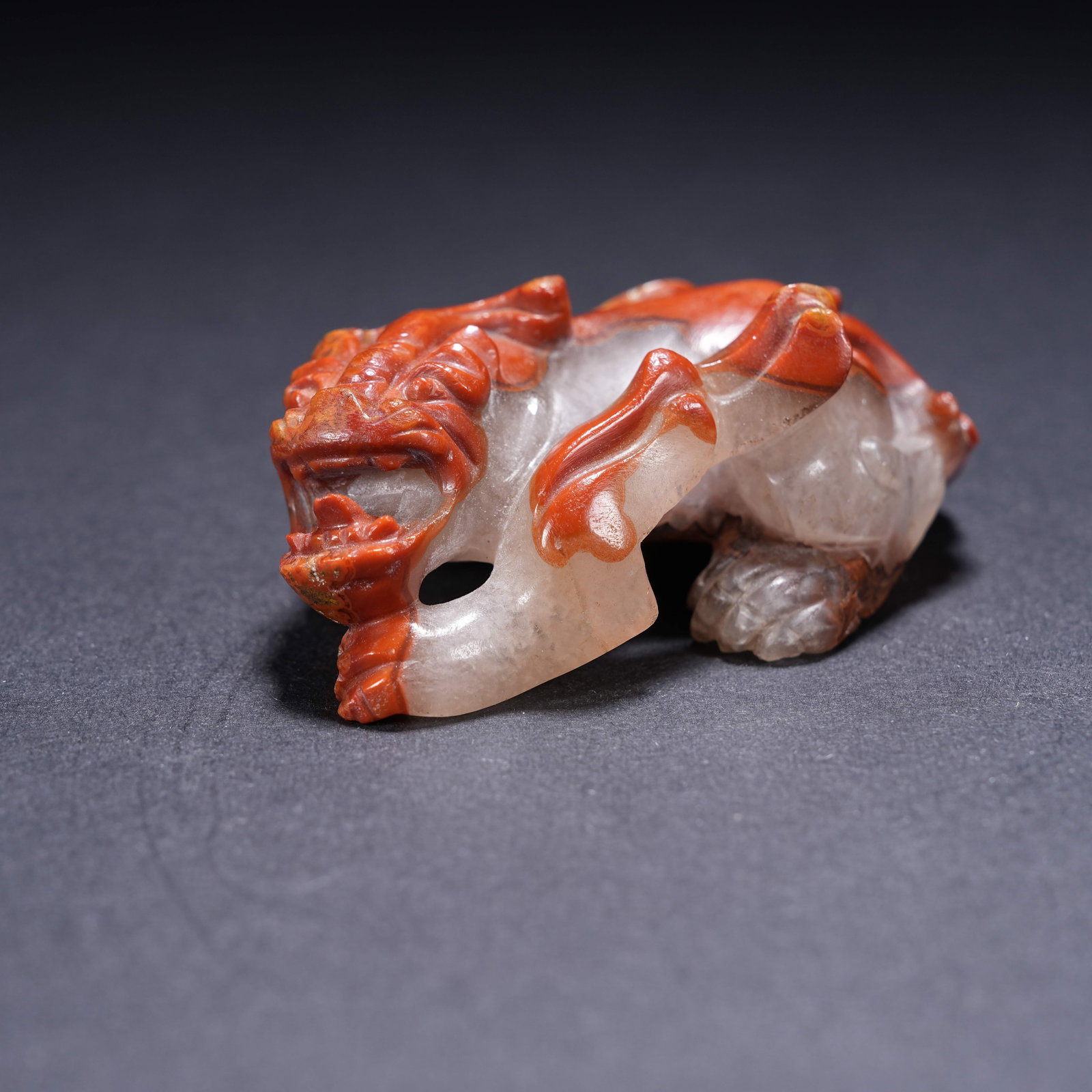 A WARRING STATES RED AGATE AUSPICIOUS BEAST (1 of 8)