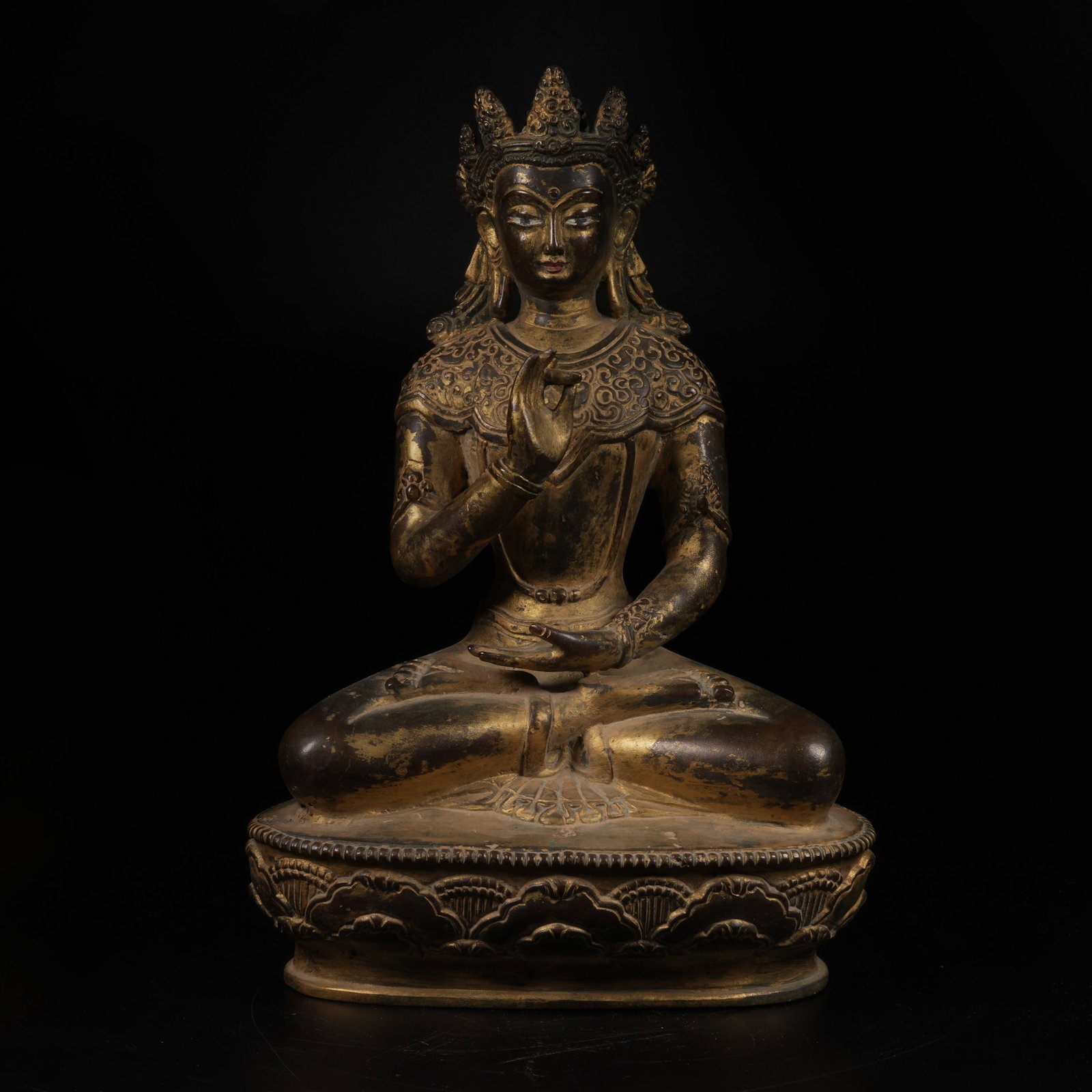 A GILT-BRONZE SHAKYAMUNI PREACHING STATUE: Gilt-Bronze Shakyamuni Preaching Statue