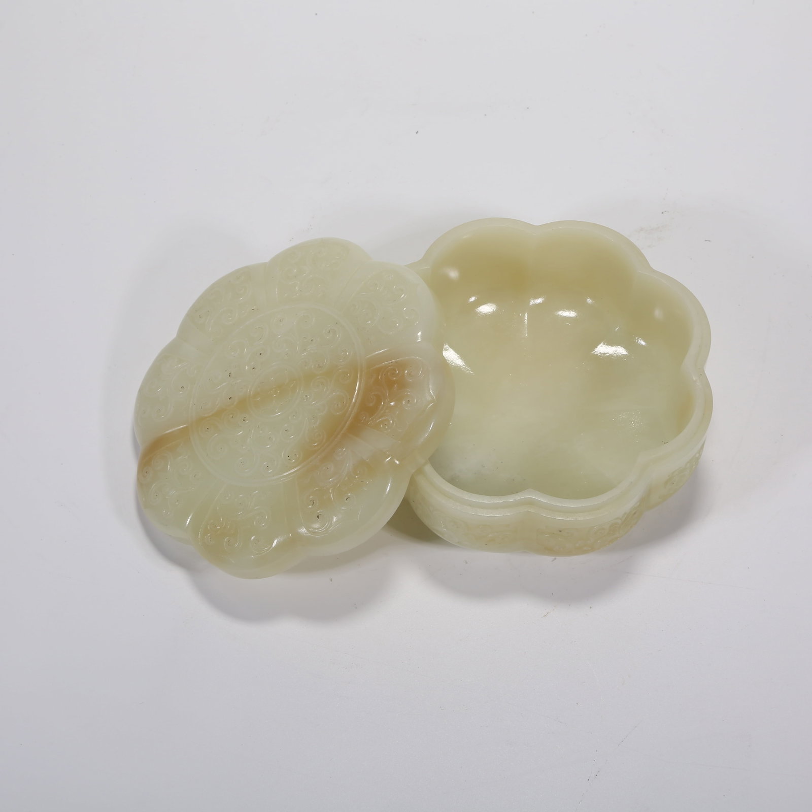 A HETIAN WHITE JADE SUNFLOWER PATTERN COVERED BOX WITH SCROLL MOTIF (1 of 9)