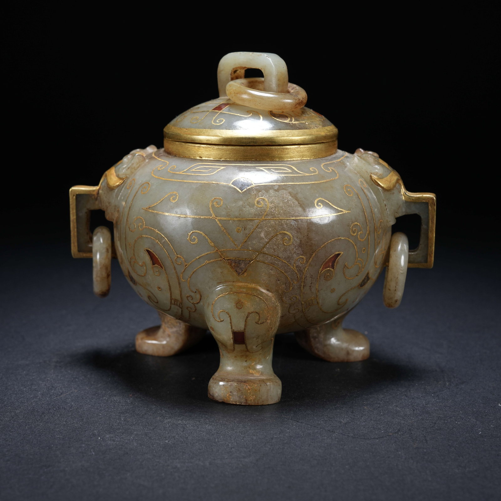 A ARCHAIC JADE CENSER WITH COVER, THREE LOOP HANDLES, GOLD INLAY AND GEMSTONE SETTINGS: Archaic jade censer with cover, three loop handles, gold inlay and gemstone settings