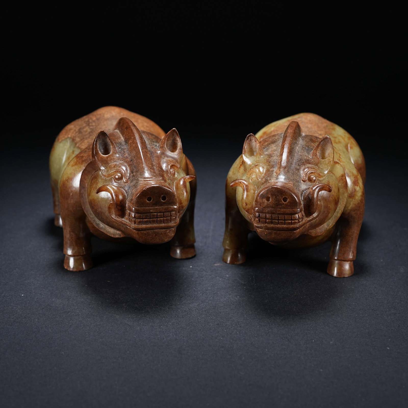A SET OF ARCHAIC JADE PIGS (1 of 10)