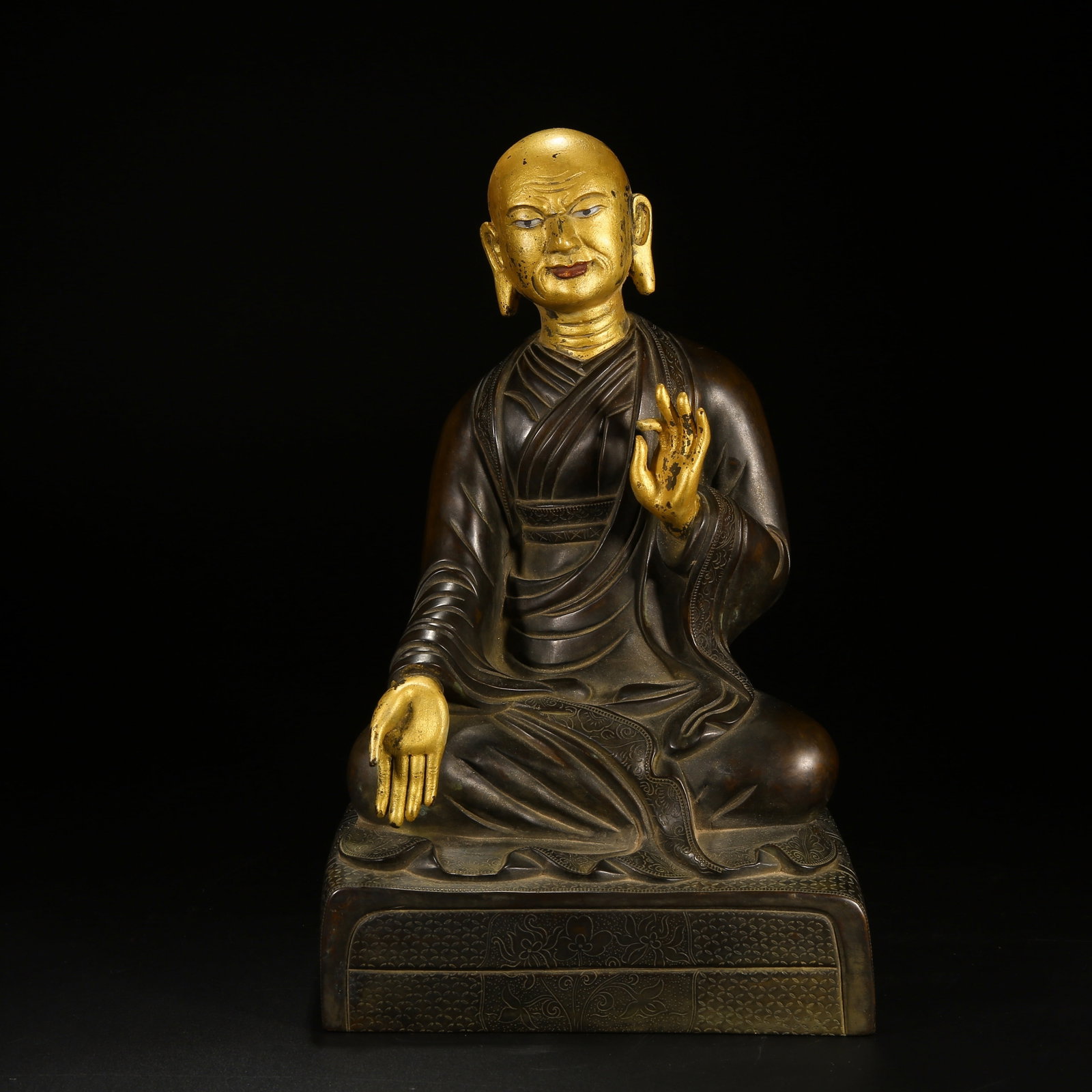 A BRONZE ARHAT STATUE WITH PARTIAL GILT DECORATION (1 of 8)
