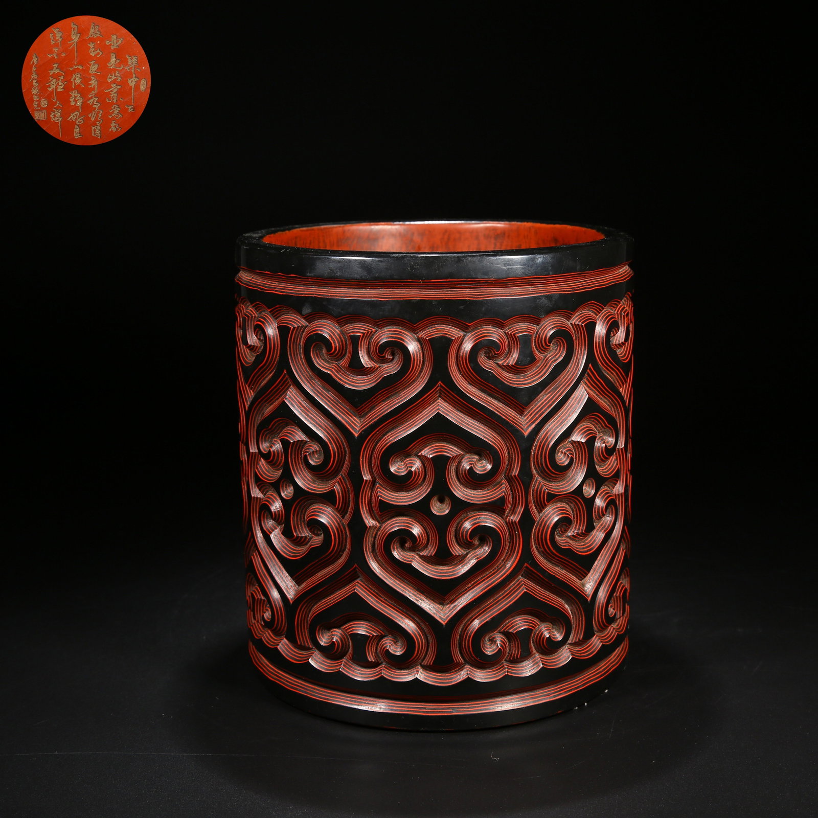 A CARVED OX-BLOOD LACQUER CLOUD PATTERN BRUSH POT (1 of 9)