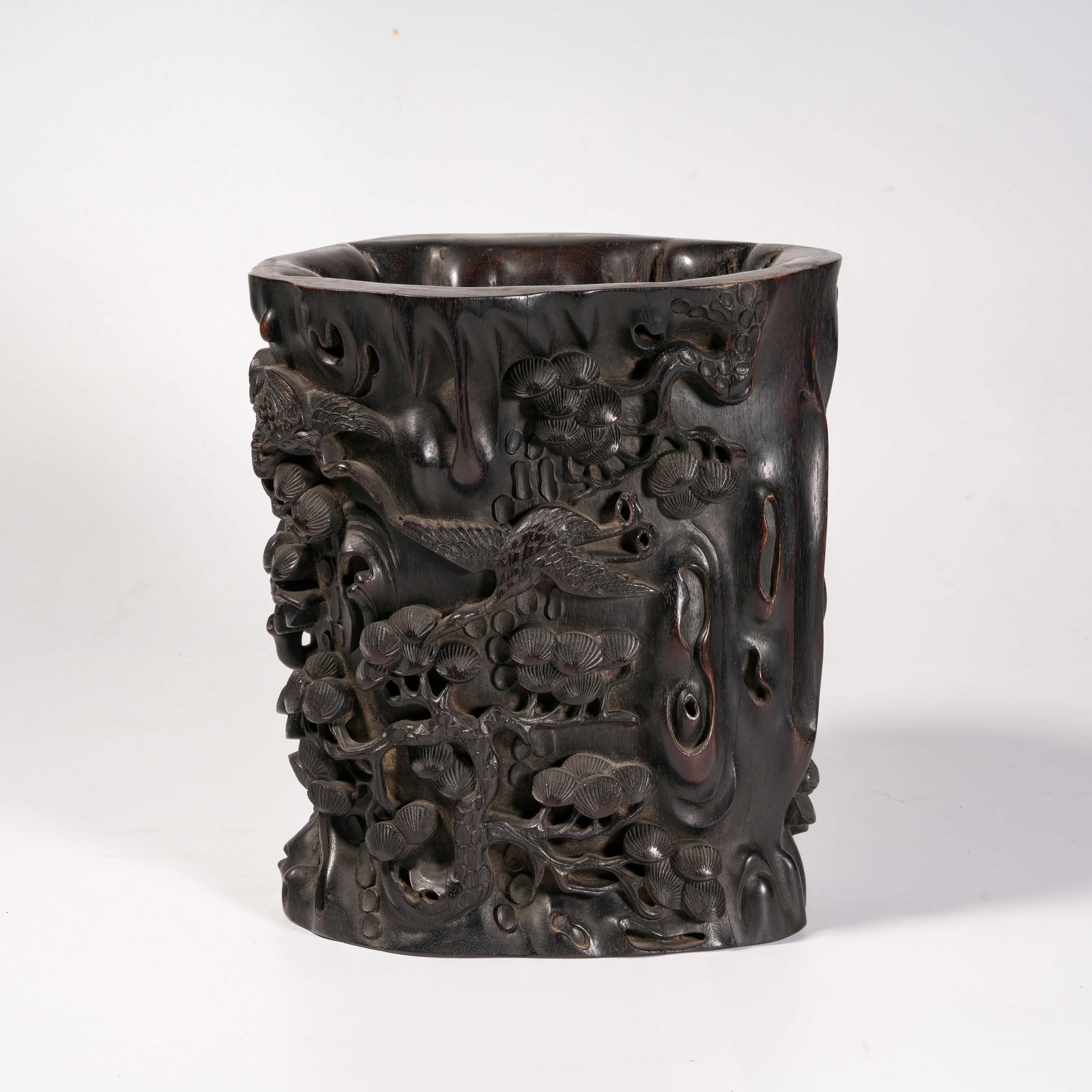 A ZITAN WOOD BRUSH POT CARVED WITH PINE AND CRANE LONGEVITY MOTIF: Zitan Wood Brush Pot Carved with Pine and Crane Longevity Motif