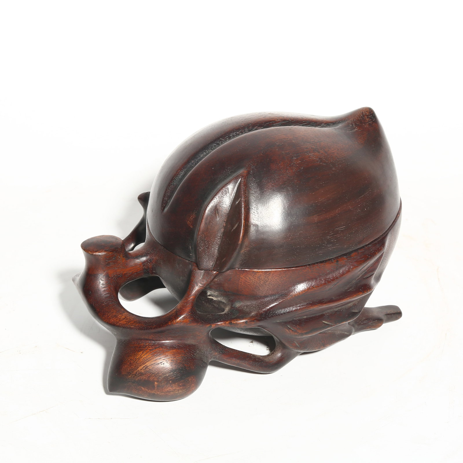 A HUANGHUALI LIDDED BOX IN THE SHAPE OF A LONGEVITY PEACH: Huanghuali Lidded Box in the Shape of a Longevity Peach