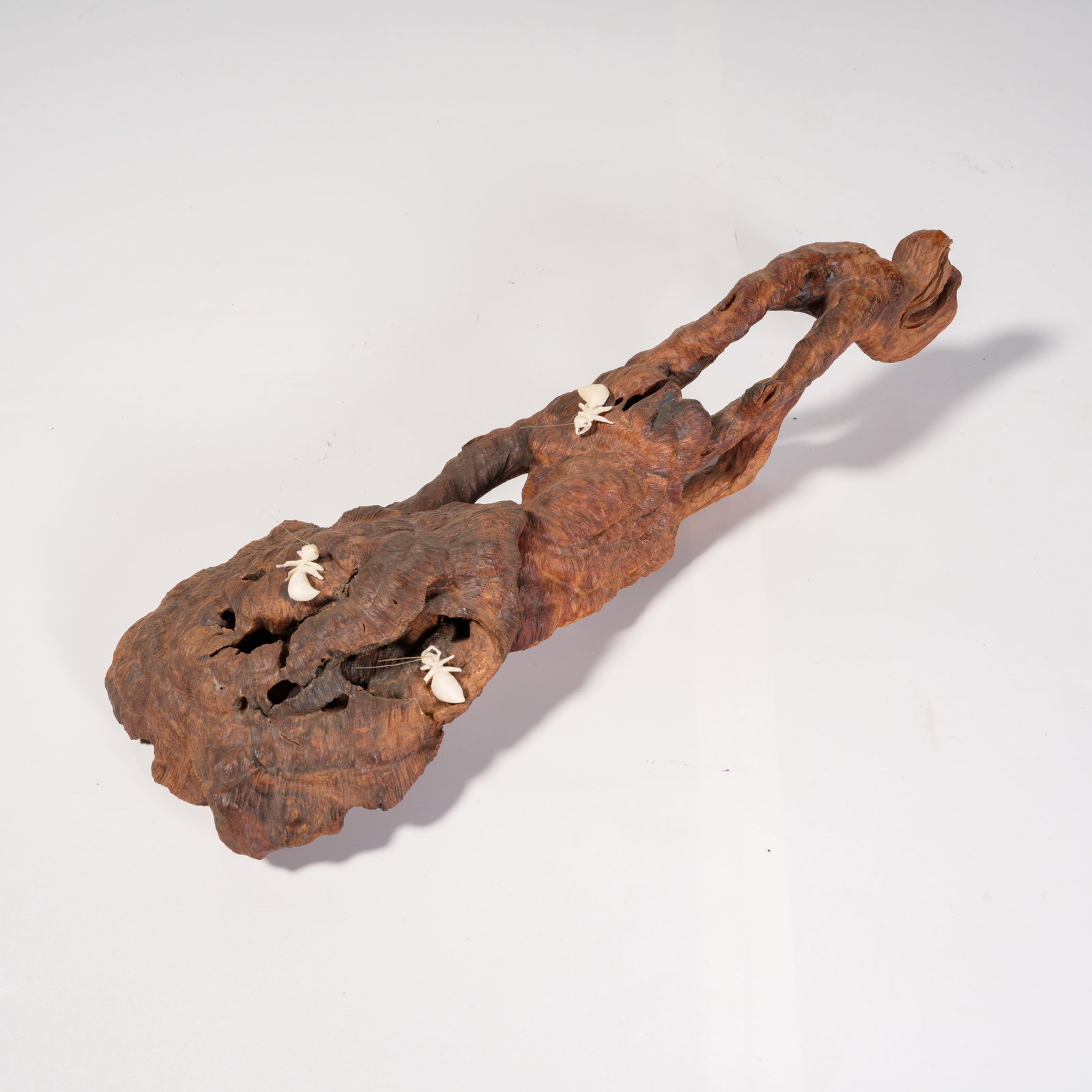 A HUANGHUALI WOOD RUYI CARVED IN LINGZHI SHAPE: Huanghuali Wood Ruyi Carved in Lingzhi Shape
