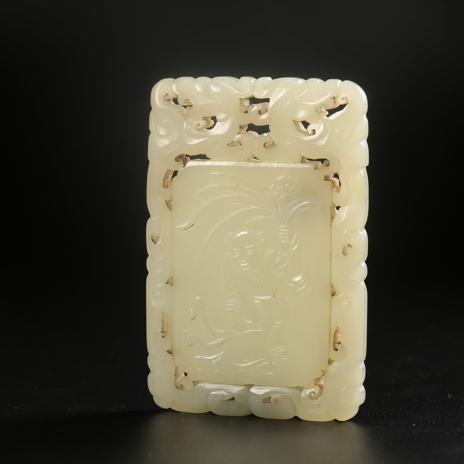 A HETIAN JADE PLAQUE CARVED WITH A CHILD AND LINGZHI MOTIF (1 of 8)