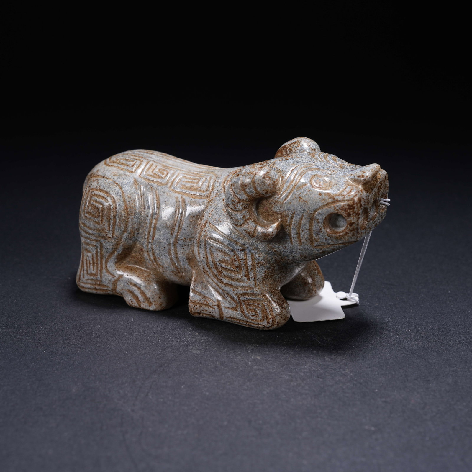 A ARCHAIC JADE RECUMBENT SHEEP (1 of 8)