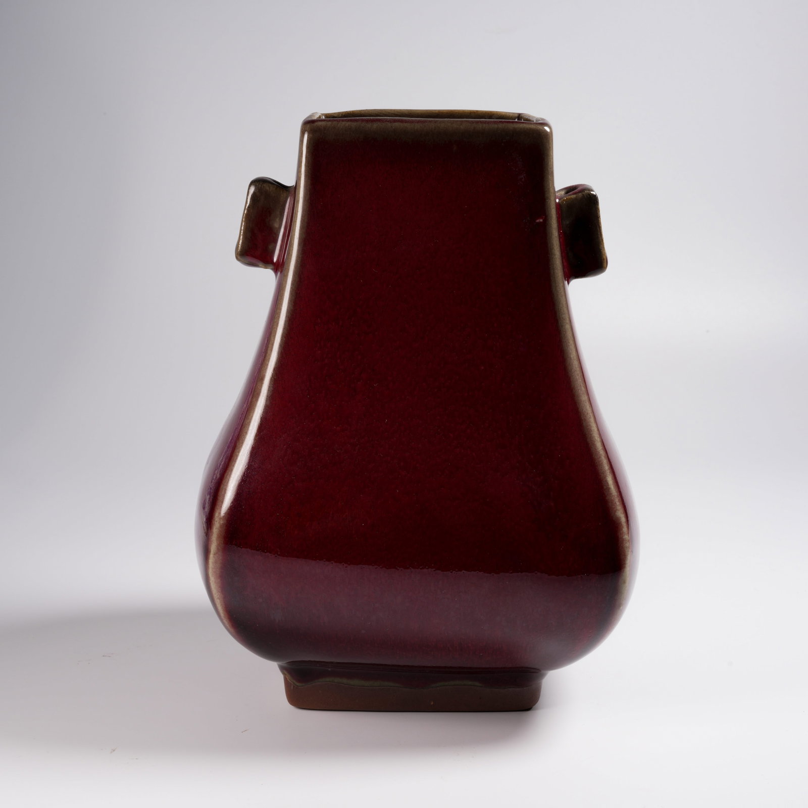 A LANGYAO RED-GLAZED GUAN-EARED VASE (1 of 10)