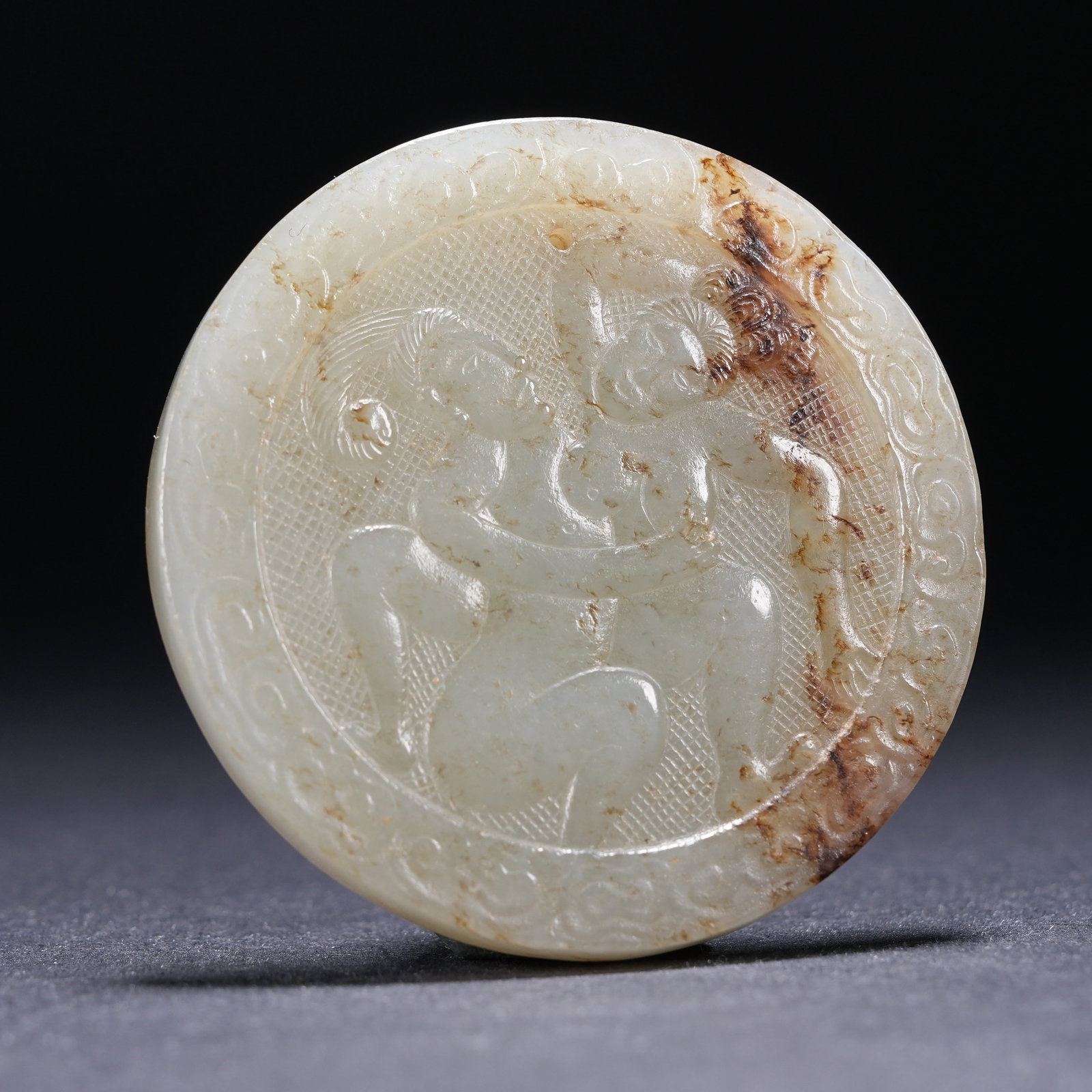 A ARCHAIC JADE EROTIC SCENE PENDANT (1 of 9)