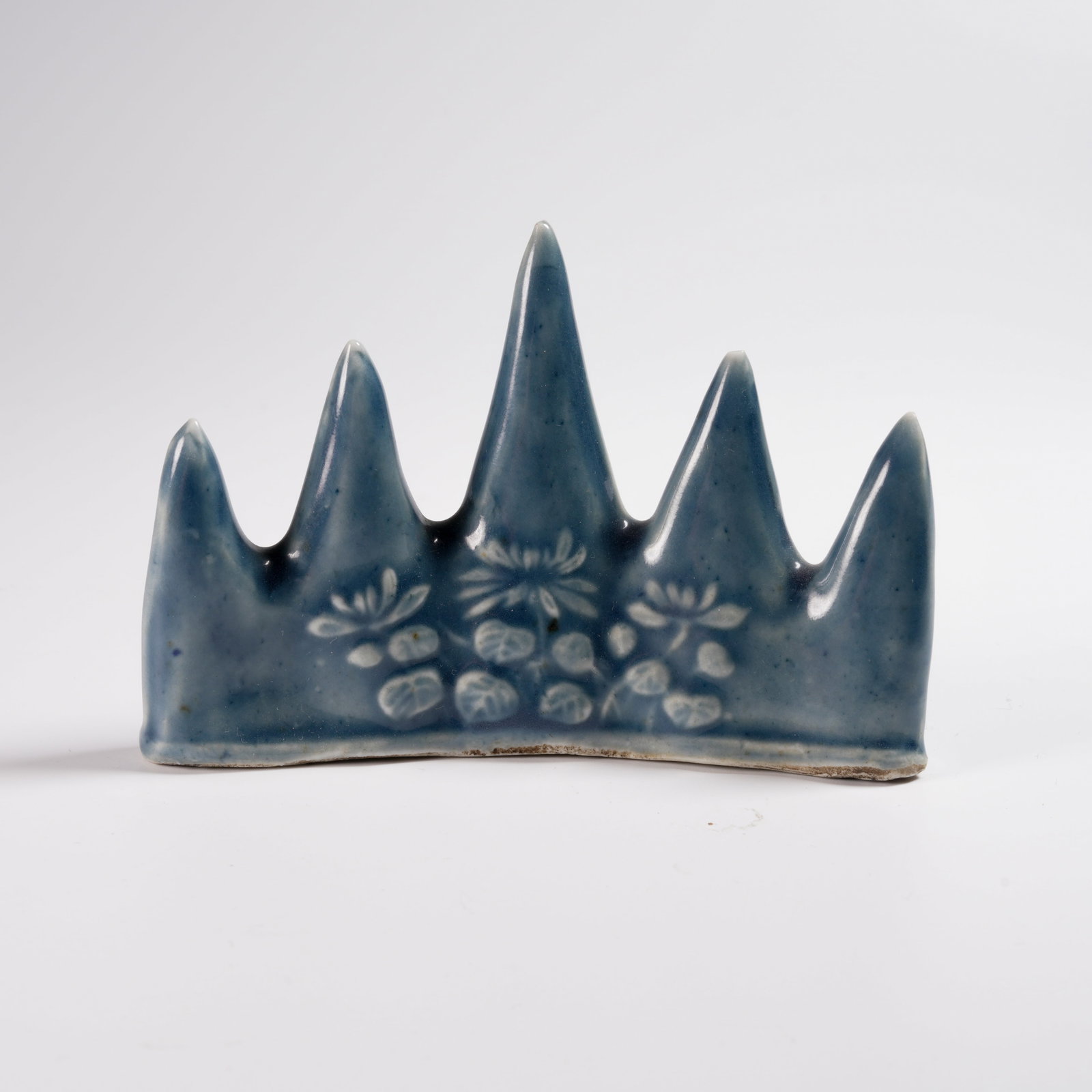 A BLUE-GLAZED FLORAL MOTIF BRUSH REST (1 of 9)