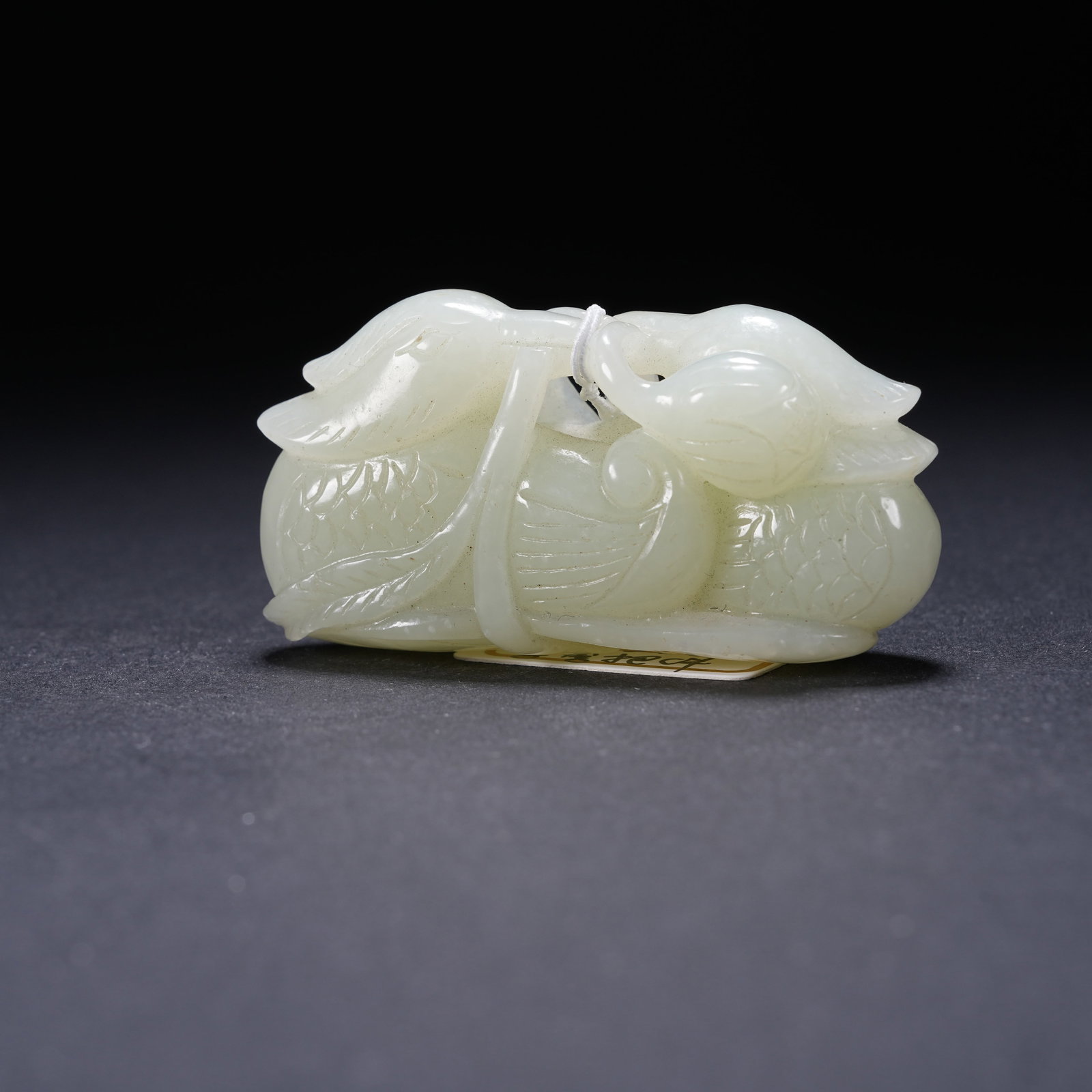 A HETIAN WHITE JADE MANDARIN DUCK HANDHELD ORNAMENT (1 of 8)
