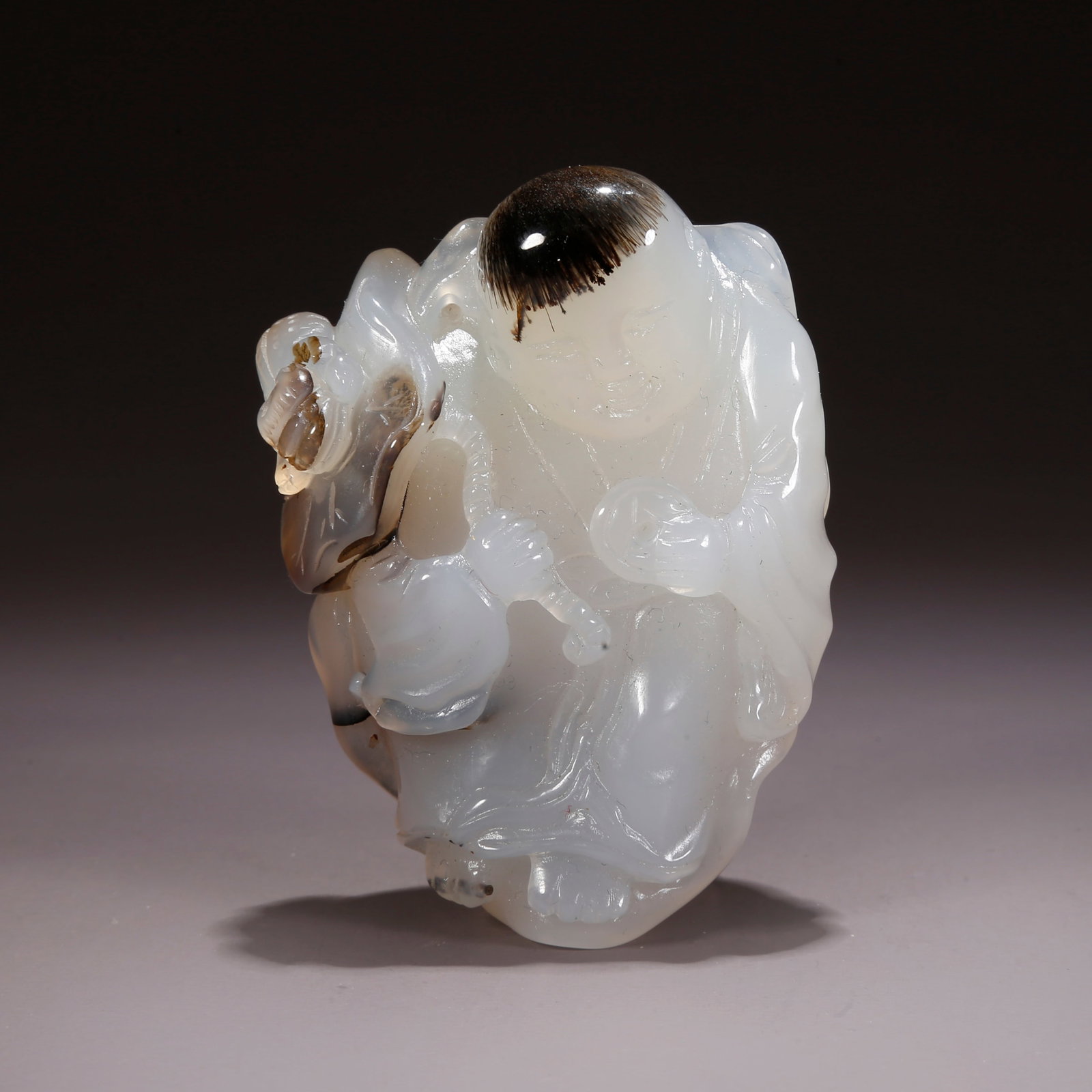 A AGATE CARVED BOY FIGURINE (1 of 9)
