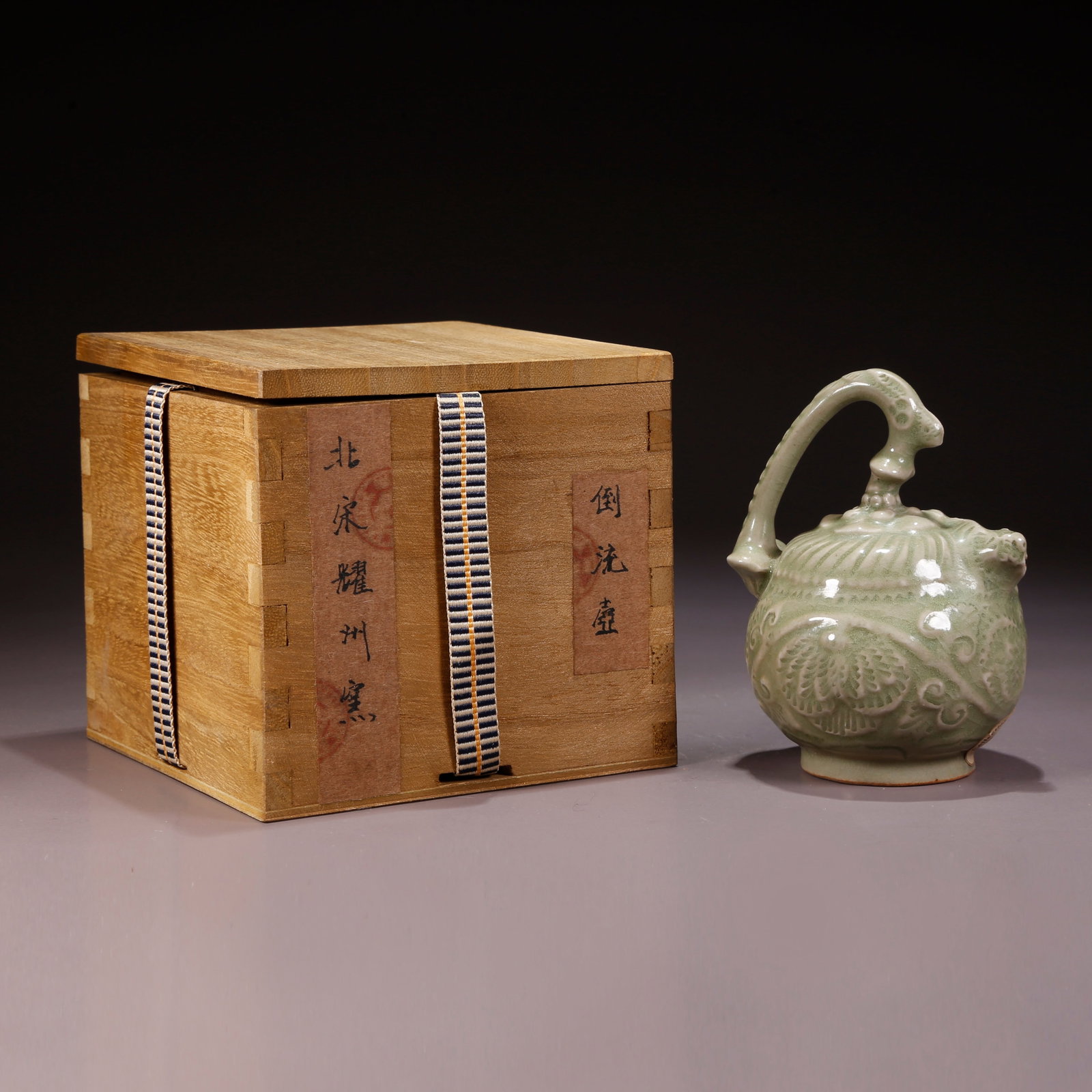 A YAOZHOU WARE POURING TEAPOT: Yaozhou Ware Pouring Teapot