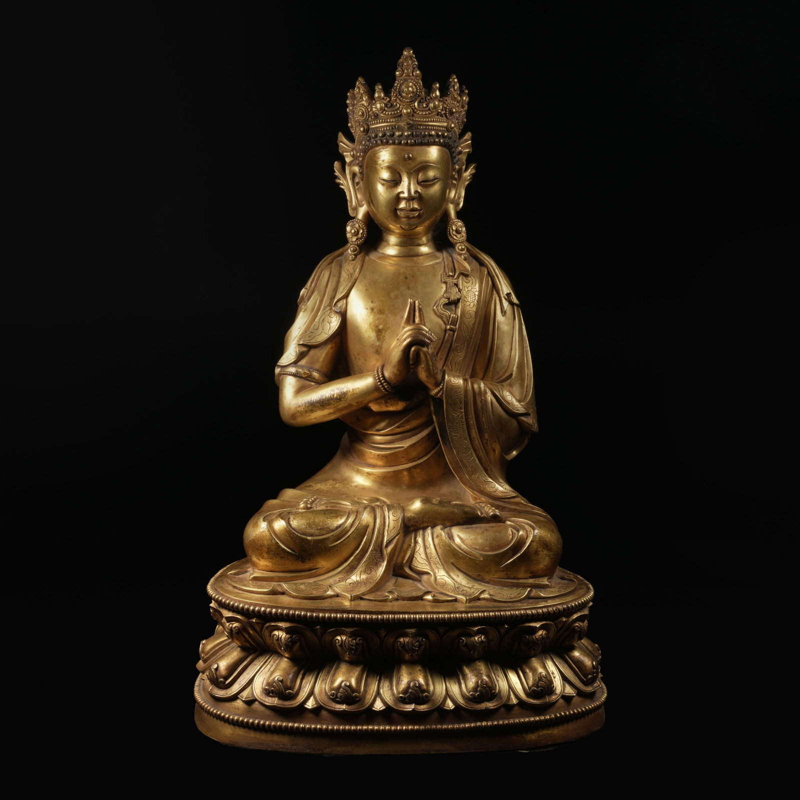 A GILT-BRONZE VAIROCANA BUDDHA STATUE (1 of 9)