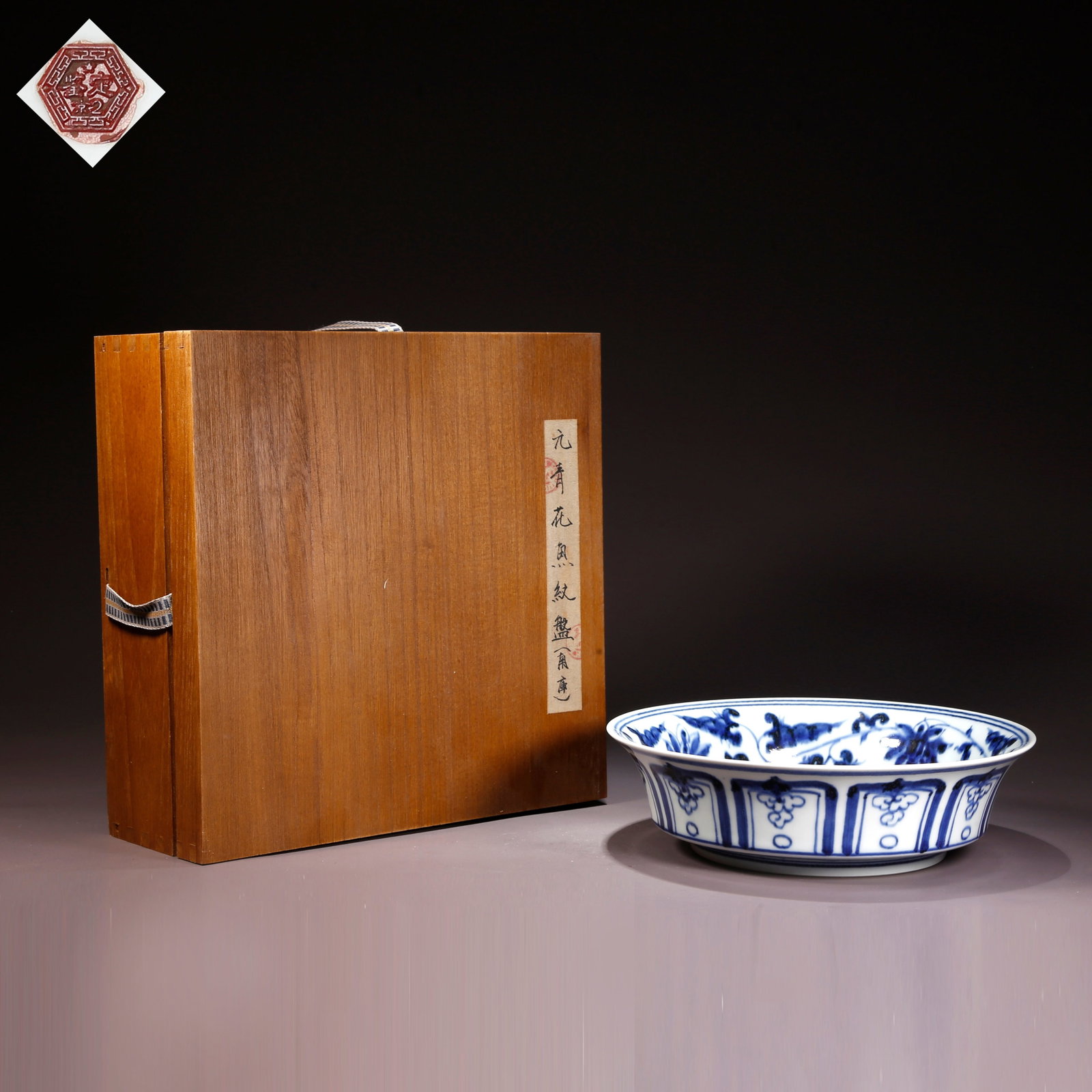 A BLUE-AND-WHITE PLATE WITH FISH MOTIF (1 of 10)