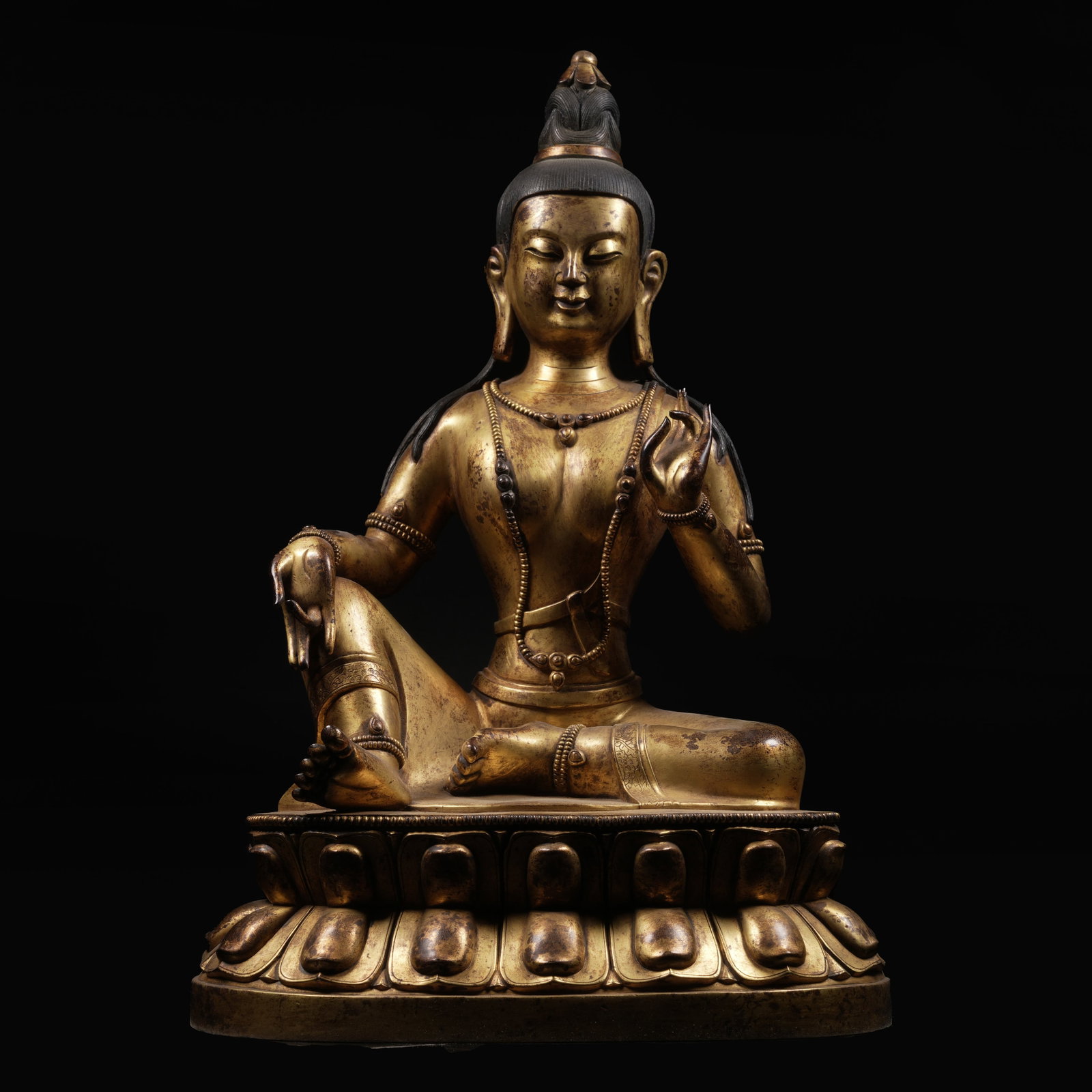 A GILT-BRONZE TARA STATUE (1 of 9)