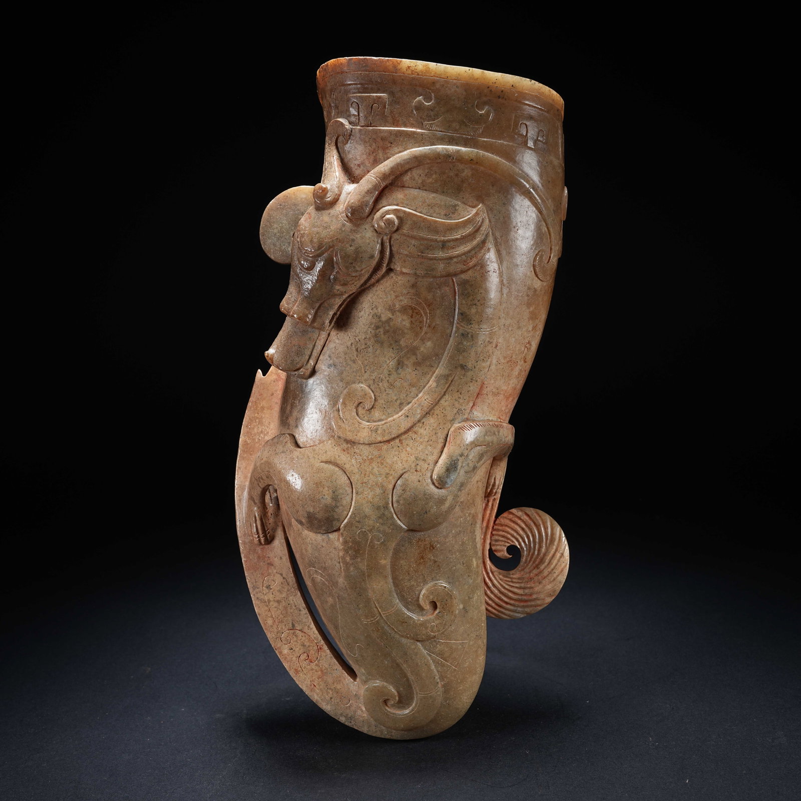 A ARCHAIC JADE GOAT-HORN CUP: Archaic Jade Goat-Horn Cup